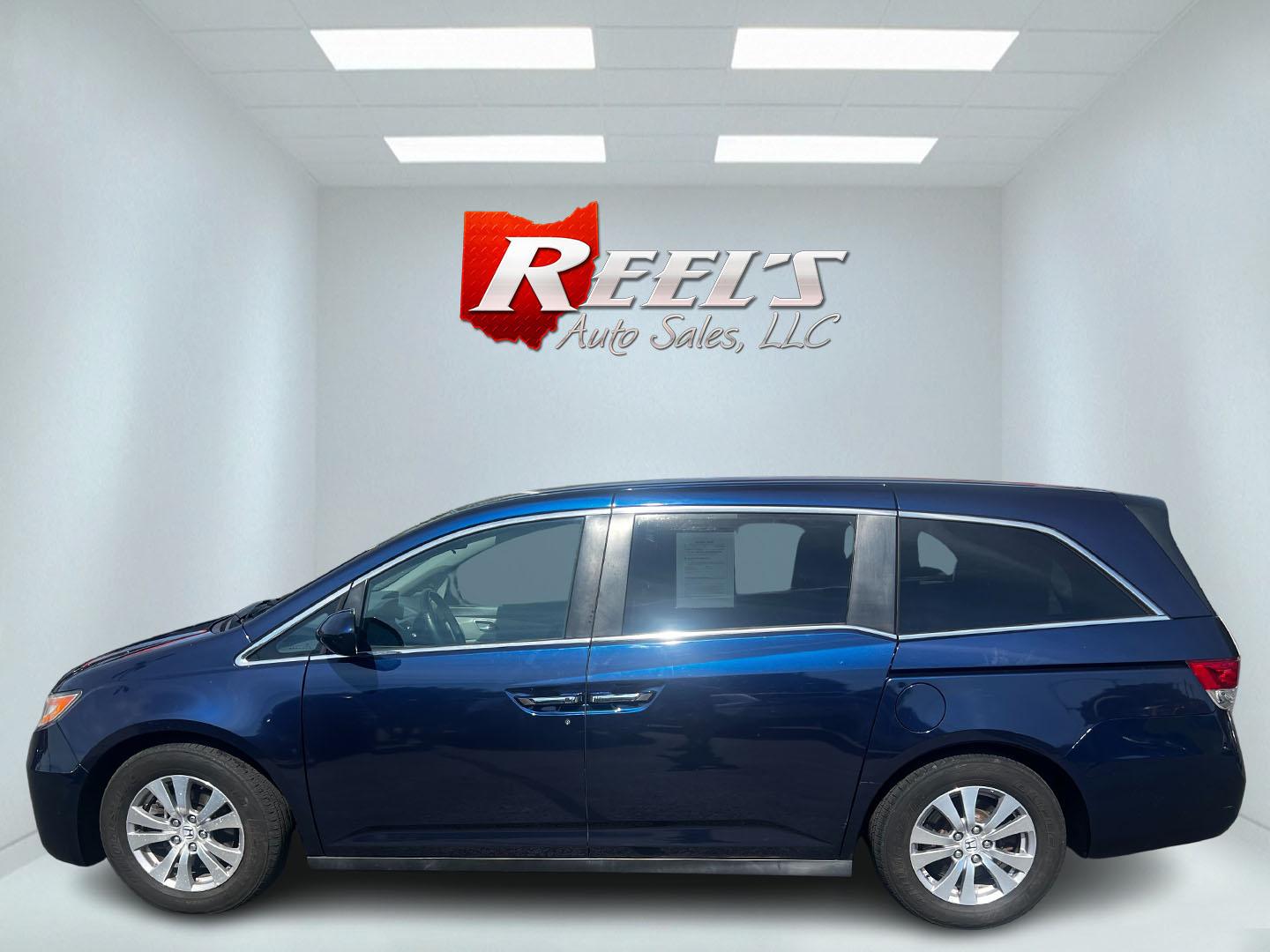 2014 Blue /Gray Honda Odyssey EX (5FNRL5H43EB) with an 3.5L V6 SOHC 24V engine, 6-Speed Automatic transmission, located at 547 E. Main St., Orwell, OH, 44076, (440) 437-5893, 41.535435, -80.847855 - Photo#9