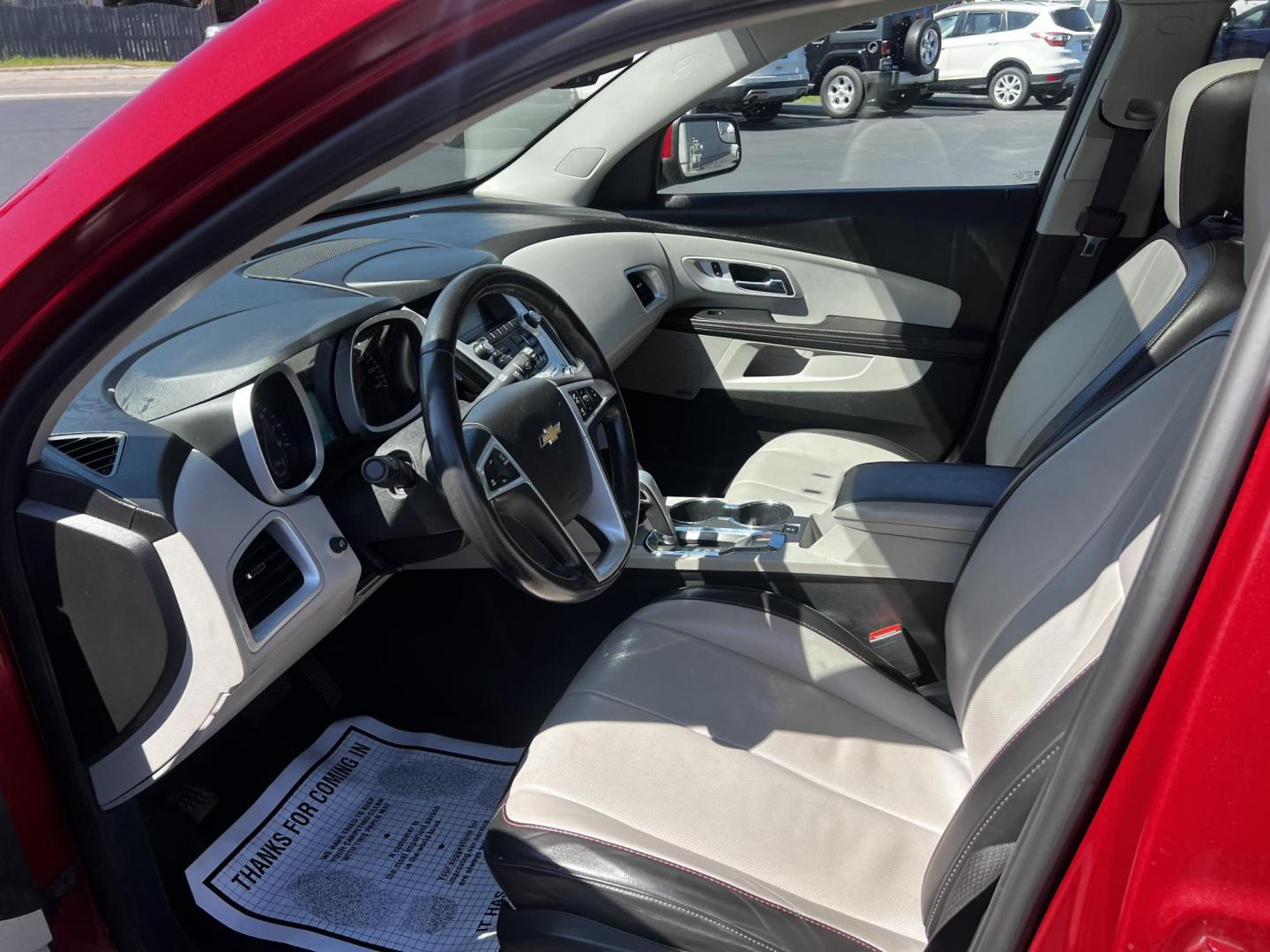 2014 Red /Gray Chevrolet Equinox 2LT AWD (2GNFLGE39E6) with an 3.6L V6 DOHC 24V engine, 6-Speed Automatic transmission, located at 11115 Chardon Rd. , Chardon, OH, 44024, (440) 214-9705, 41.580246, -81.241943 - This 2014 Chevrolet Equinox 2LT AWD is a feature-rich SUV, offering a potent 3.6-liter V6 engine that delivers 301 horsepower and accelerates from 0-60 mph in 6.7 seconds, all while being paired with a 6-speed automatic transmission. Designed for both comfort and utility, it includes a leather inter - Photo#16