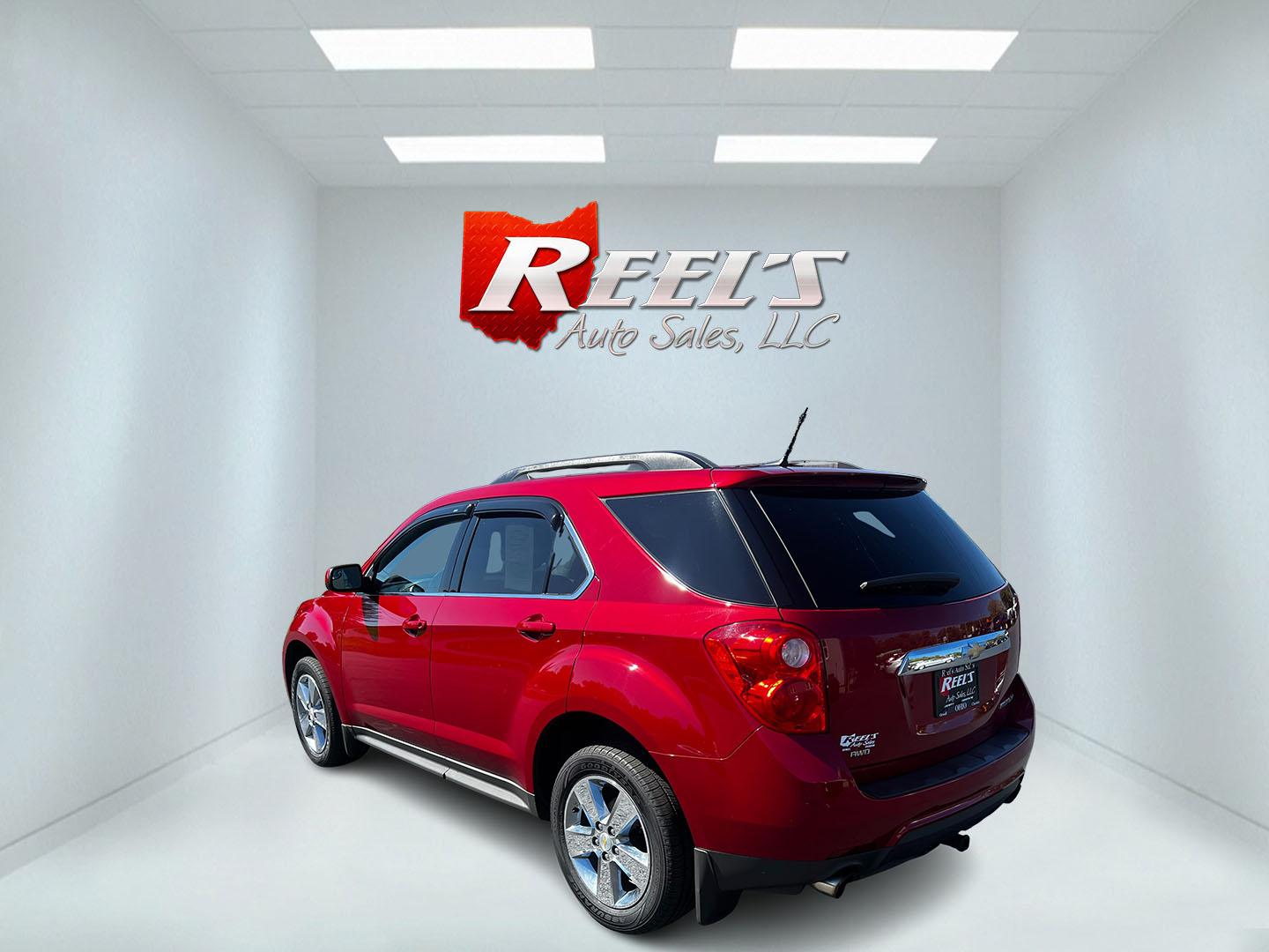 2014 Red /Gray Chevrolet Equinox 2LT AWD (2GNFLGE39E6) with an 3.6L V6 DOHC 24V engine, 6-Speed Automatic transmission, located at 11115 Chardon Rd. , Chardon, OH, 44024, (440) 214-9705, 41.580246, -81.241943 - This 2014 Chevrolet Equinox 2LT AWD is a feature-rich SUV, offering a potent 3.6-liter V6 engine that delivers 301 horsepower and accelerates from 0-60 mph in 6.7 seconds, all while being paired with a 6-speed automatic transmission. Designed for both comfort and utility, it includes a leather inter - Photo#7