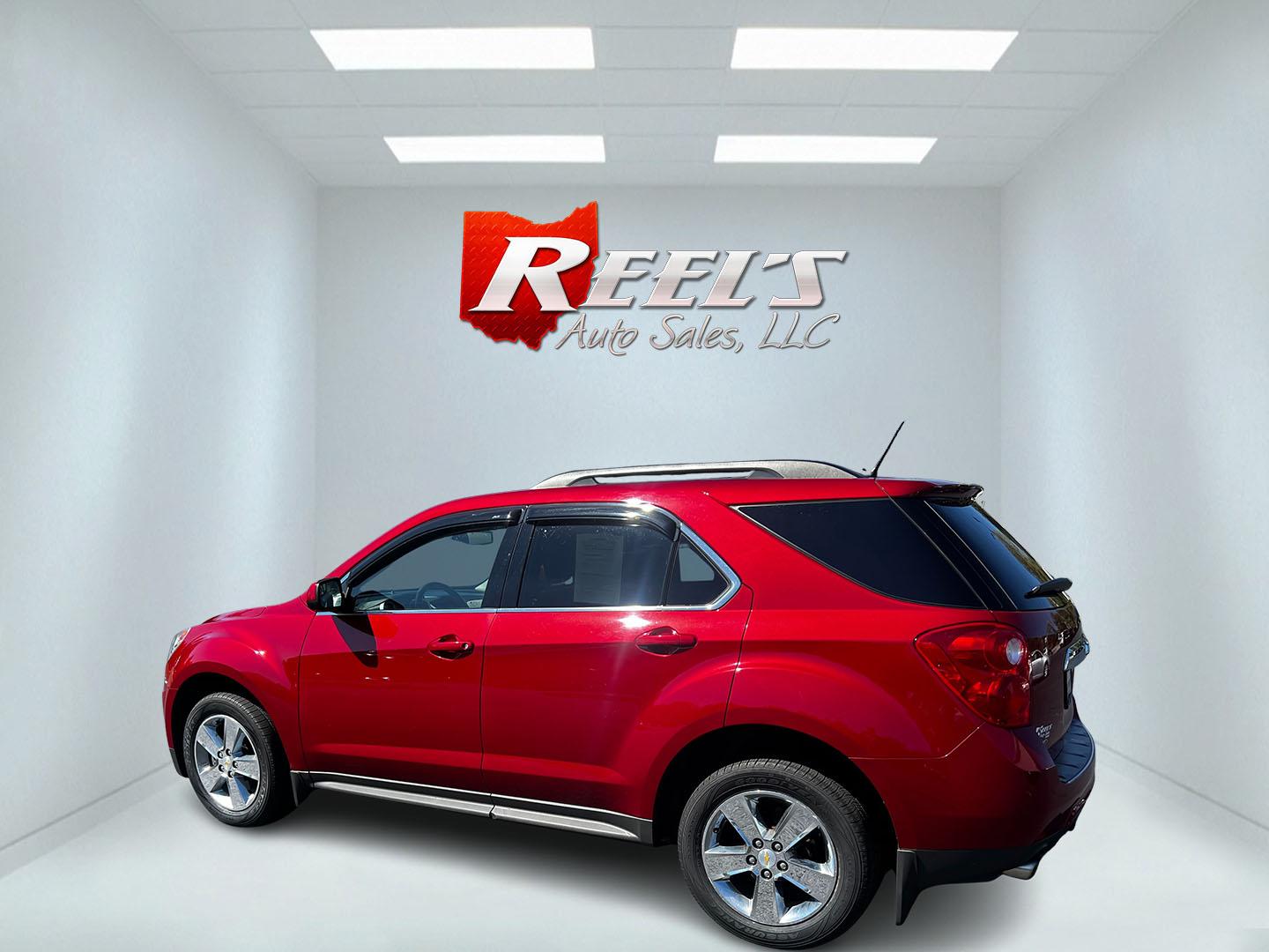 2014 Red /Gray Chevrolet Equinox 2LT AWD (2GNFLGE39E6) with an 3.6L V6 DOHC 24V engine, 6-Speed Automatic transmission, located at 11115 Chardon Rd. , Chardon, OH, 44024, (440) 214-9705, 41.580246, -81.241943 - This 2014 Chevrolet Equinox 2LT AWD is a feature-rich SUV, offering a potent 3.6-liter V6 engine that delivers 301 horsepower and accelerates from 0-60 mph in 6.7 seconds, all while being paired with a 6-speed automatic transmission. Designed for both comfort and utility, it includes a leather inter - Photo#8