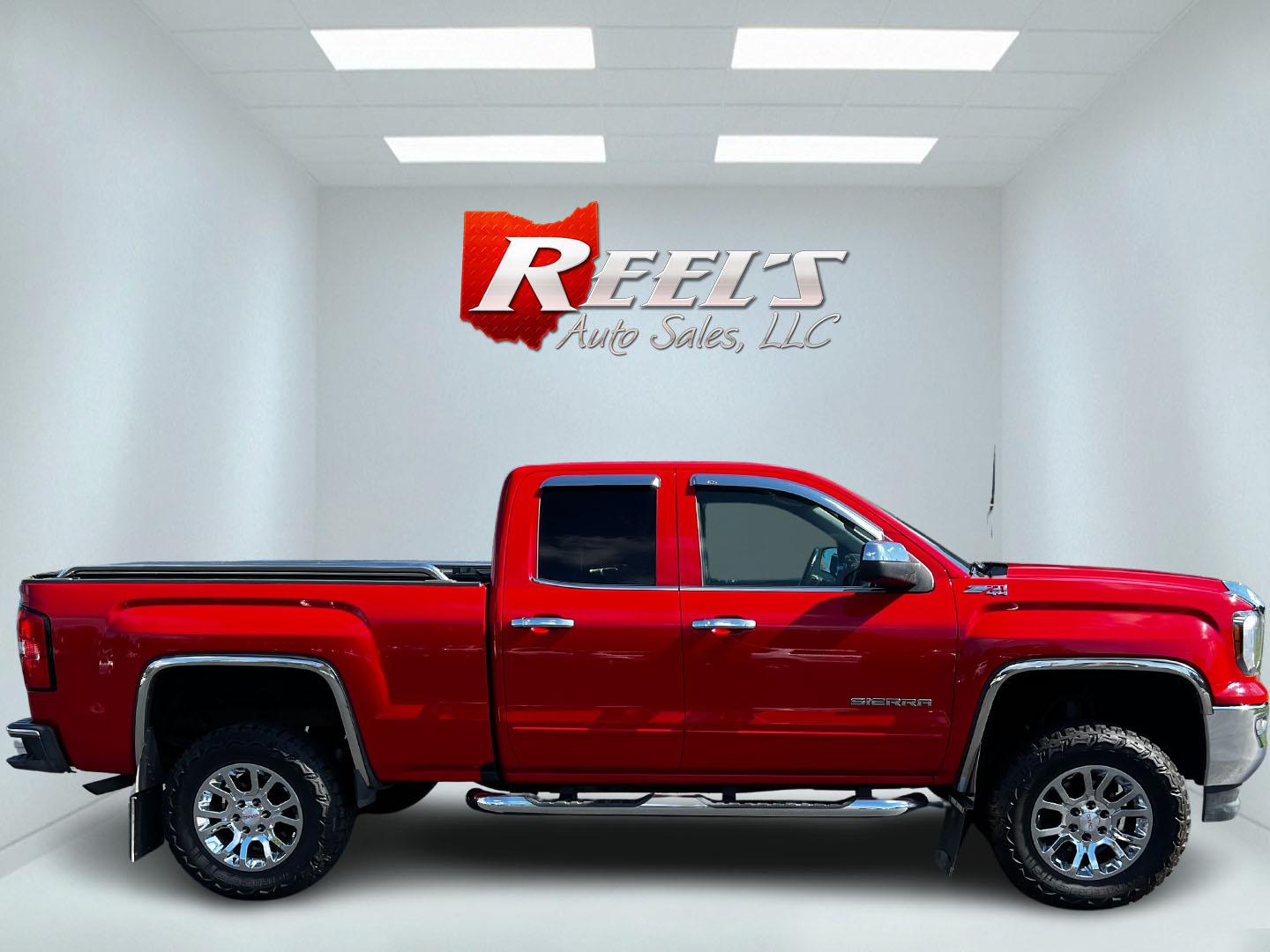 2018 Red /Black GMC Sierra 1500 SLE Double Cab 4WD (1GTV2MEC4JZ) with an 5.3L V8 OHV 16V engine, 6 Speed Automatic transmission, located at 11115 Chardon Rd. , Chardon, OH, 44024, (440) 214-9705, 41.580246, -81.241943 - This 2018 GMC Sierra 1500 SLE Double Cab 4WD is a robust pickup designed for both power and modern convenience, featuring a 5.3-liter Vortec V8 engine producing 355 horsepower with 3.42 gearing, and offering a towing capacity of 9,000 pounds. This truck is equipped for off-road and towing capabiliti - Photo#4