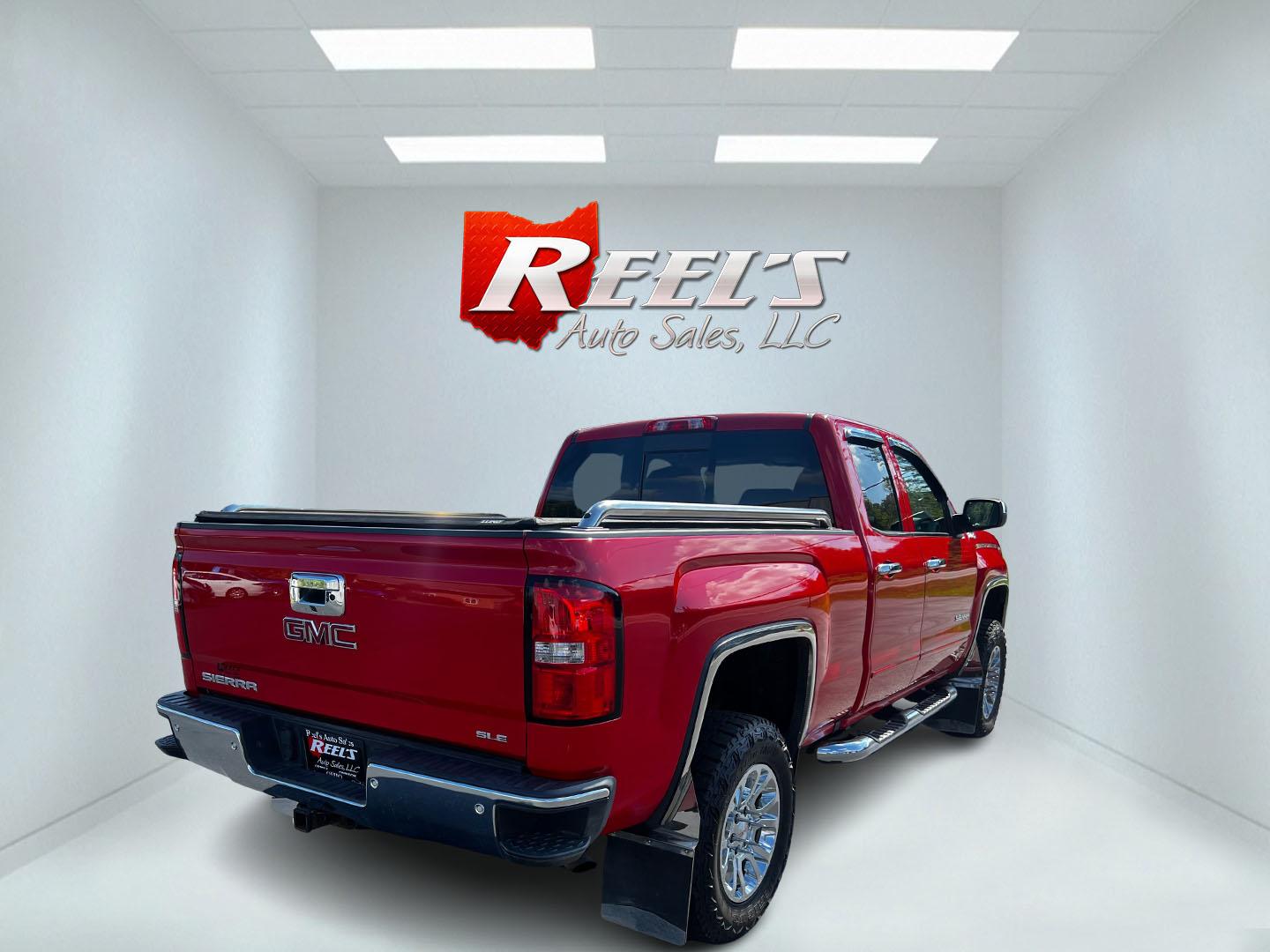 2018 Red /Black GMC Sierra 1500 SLE Double Cab 4WD (1GTV2MEC4JZ) with an 5.3L V8 OHV 16V engine, 6 Speed Automatic transmission, located at 547 E. Main St., Orwell, OH, 44076, (440) 437-5893, 41.535435, -80.847855 - This 2018 GMC Sierra 1500 SLE Double Cab 4WD is a robust pickup designed for both power and modern convenience, featuring a 5.3-liter Vortec V8 engine producing 355 horsepower with 3.42 gearing, and offering a towing capacity of 9,000 pounds. This truck is equipped for off-road and towing capabiliti - Photo#5