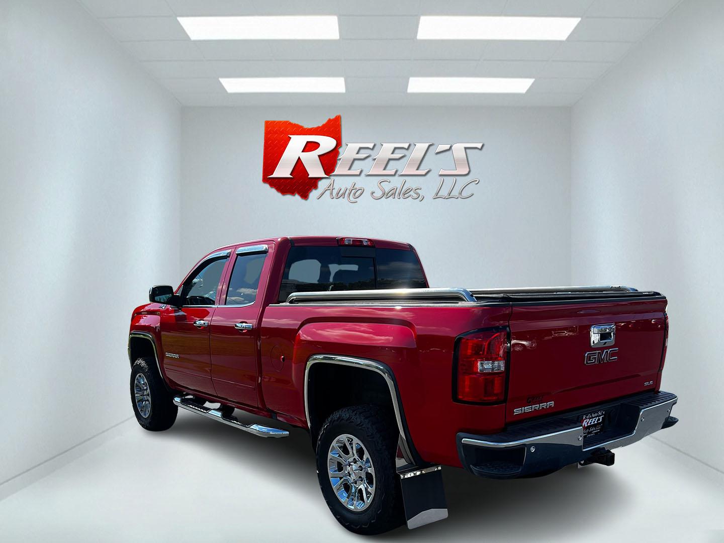 2018 Red /Black GMC Sierra 1500 SLE Double Cab 4WD (1GTV2MEC4JZ) with an 5.3L V8 OHV 16V engine, 6 Speed Automatic transmission, located at 547 E. Main St., Orwell, OH, 44076, (440) 437-5893, 41.535435, -80.847855 - This 2018 GMC Sierra 1500 SLE Double Cab 4WD is a robust pickup designed for both power and modern convenience, featuring a 5.3-liter Vortec V8 engine producing 355 horsepower with 3.42 gearing, and offering a towing capacity of 9,000 pounds. This truck is equipped for off-road and towing capabiliti - Photo#7