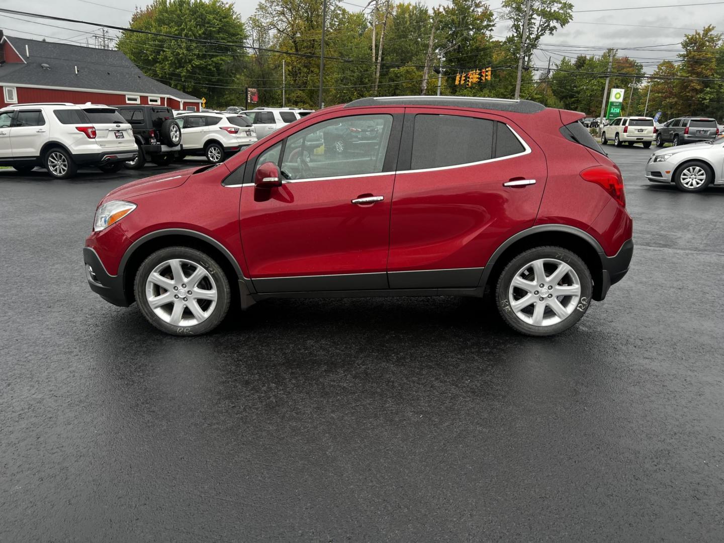 2015 Red /Gray Buick Encore Premium AWD (KL4CJHSBXFB) with an 1.4L I4 DOHC 16V TURBO engine, 6-Speed Automatic transmission, located at 11115 Chardon Rd. , Chardon, OH, 44024, (440) 214-9705, 41.580246, -81.241943 - Photo#10