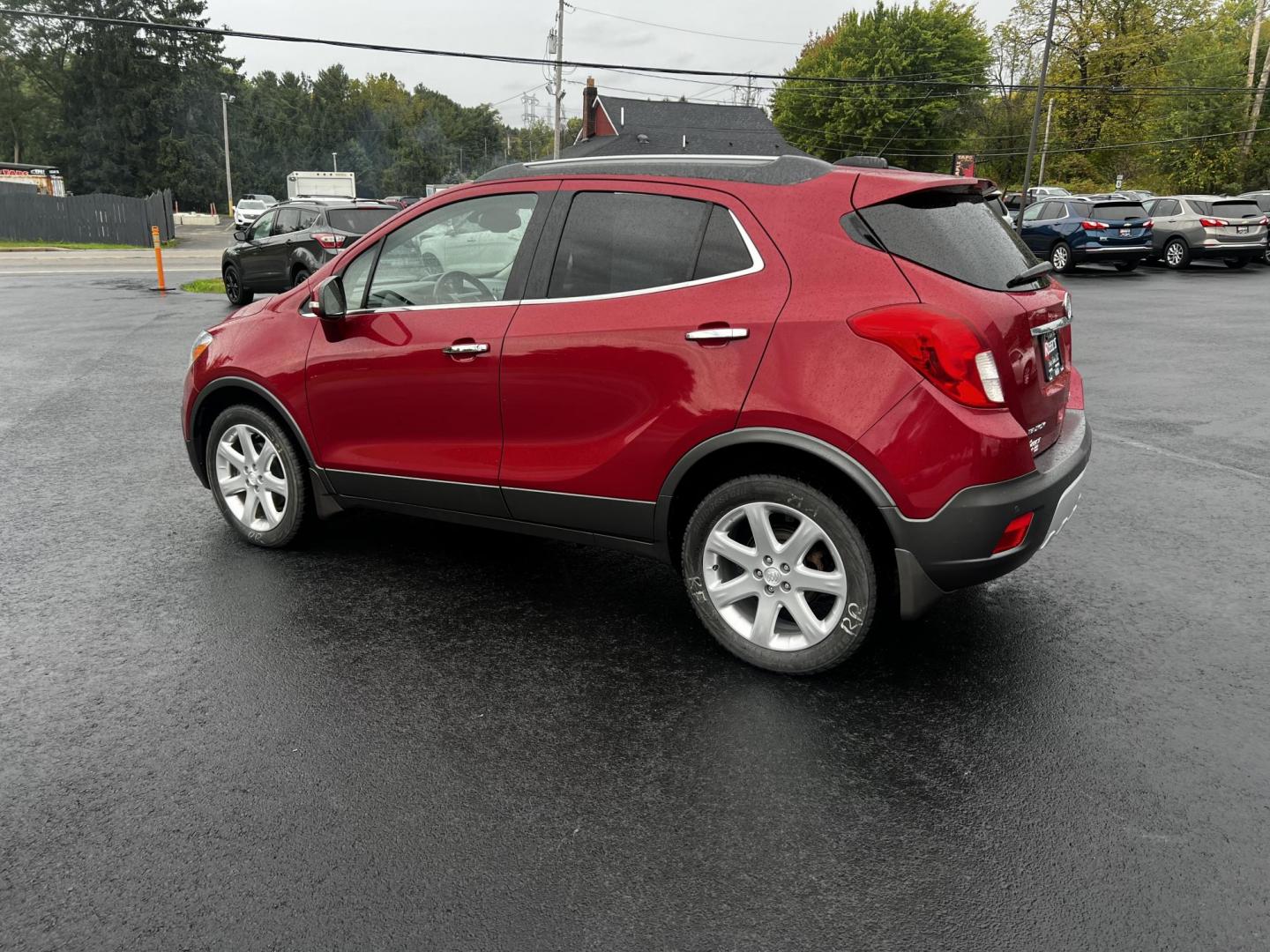 2015 Red /Gray Buick Encore Premium AWD (KL4CJHSBXFB) with an 1.4L I4 DOHC 16V TURBO engine, 6-Speed Automatic transmission, located at 11115 Chardon Rd. , Chardon, OH, 44024, (440) 214-9705, 41.580246, -81.241943 - Photo#11