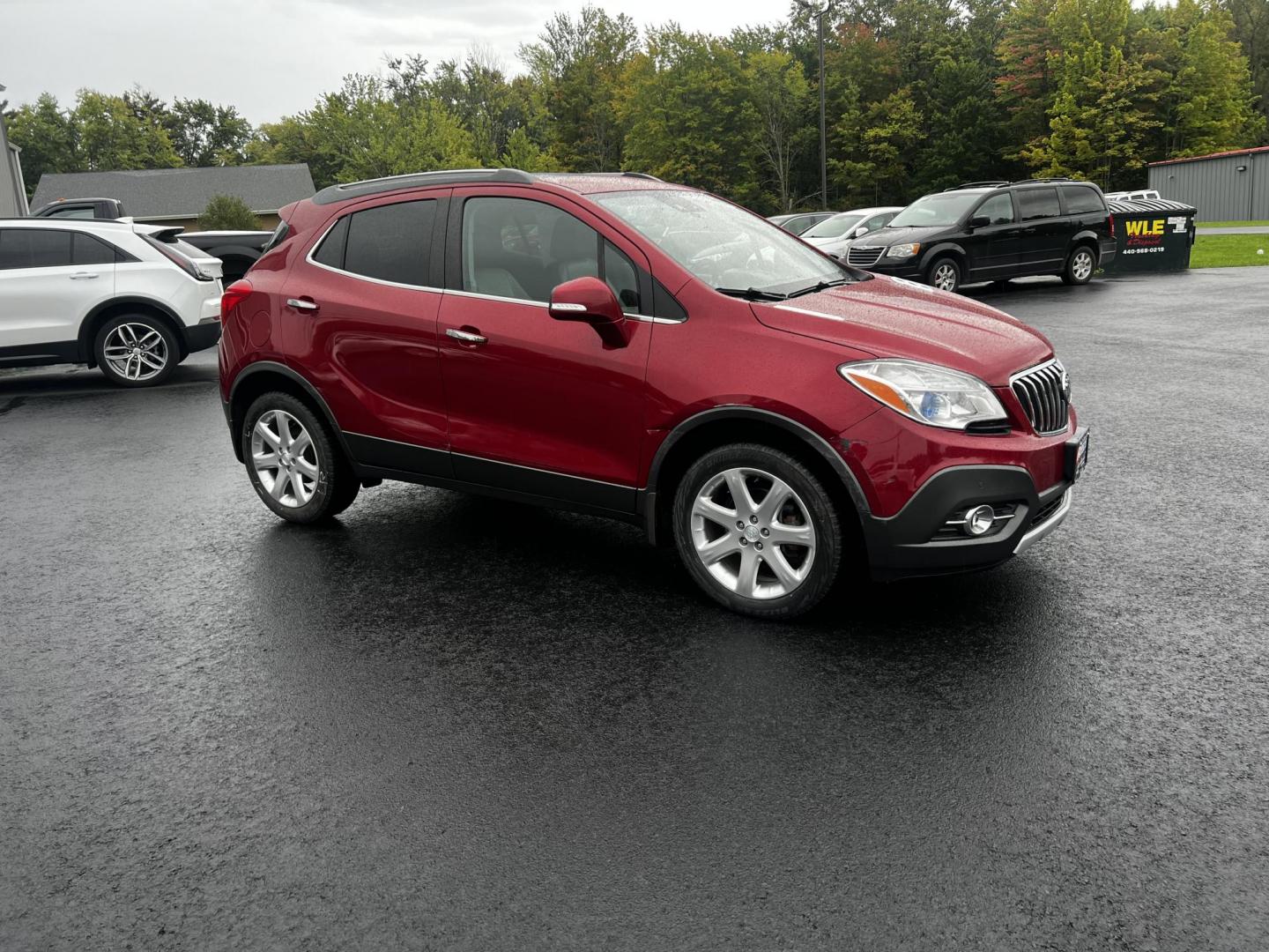 2015 Red /Gray Buick Encore Premium AWD (KL4CJHSBXFB) with an 1.4L I4 DOHC 16V TURBO engine, 6-Speed Automatic transmission, located at 11115 Chardon Rd. , Chardon, OH, 44024, (440) 214-9705, 41.580246, -81.241943 - Photo#2