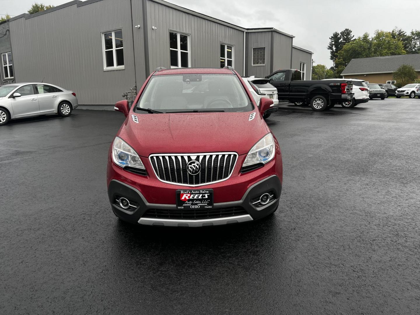 2015 Red /Gray Buick Encore Premium AWD (KL4CJHSBXFB) with an 1.4L I4 DOHC 16V TURBO engine, 6-Speed Automatic transmission, located at 11115 Chardon Rd. , Chardon, OH, 44024, (440) 214-9705, 41.580246, -81.241943 - Photo#3