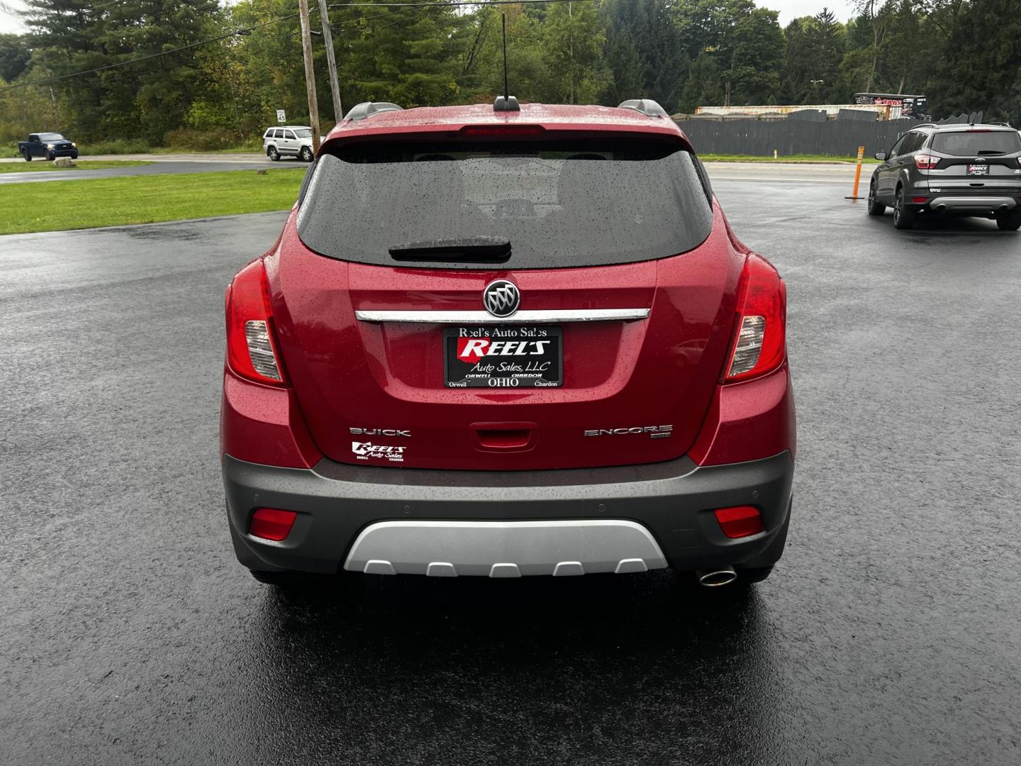 2015 Red /Gray Buick Encore Premium AWD (KL4CJHSBXFB) with an 1.4L I4 DOHC 16V TURBO engine, 6-Speed Automatic transmission, located at 11115 Chardon Rd. , Chardon, OH, 44024, (440) 214-9705, 41.580246, -81.241943 - Photo#7