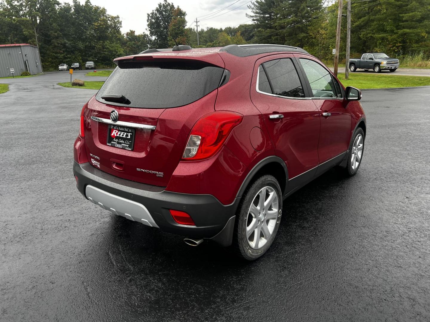 2015 Red /Gray Buick Encore Premium AWD (KL4CJHSBXFB) with an 1.4L I4 DOHC 16V TURBO engine, 6-Speed Automatic transmission, located at 11115 Chardon Rd. , Chardon, OH, 44024, (440) 214-9705, 41.580246, -81.241943 - Photo#8