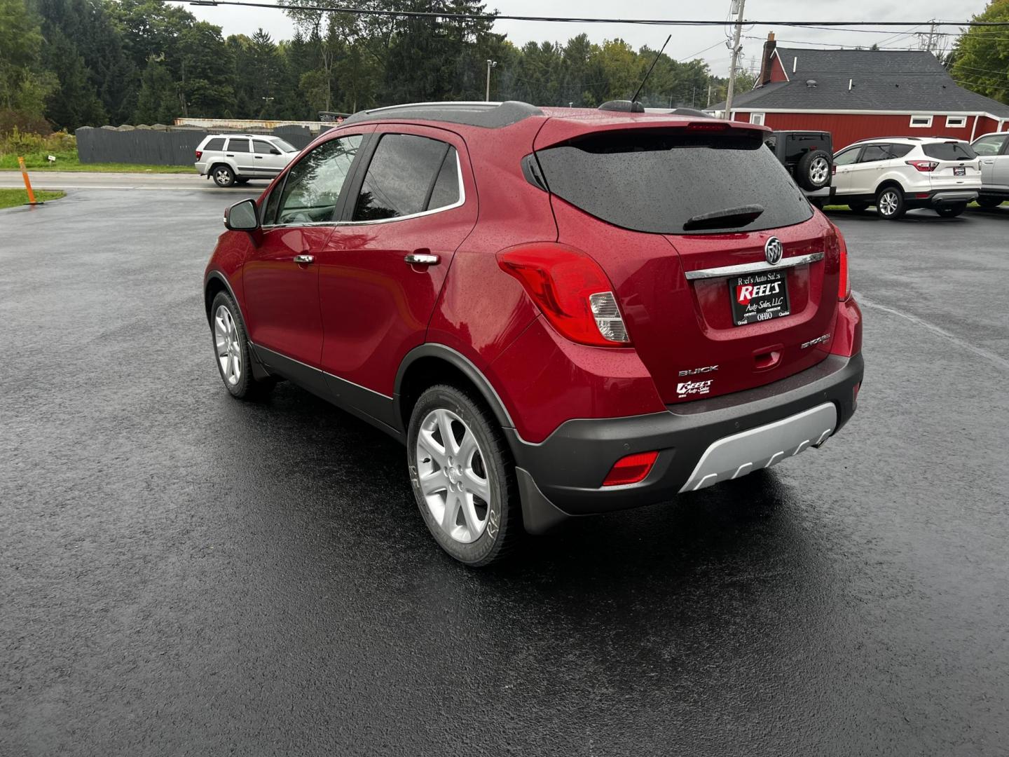 2015 Red /Gray Buick Encore Premium AWD (KL4CJHSBXFB) with an 1.4L I4 DOHC 16V TURBO engine, 6-Speed Automatic transmission, located at 11115 Chardon Rd. , Chardon, OH, 44024, (440) 214-9705, 41.580246, -81.241943 - Photo#9