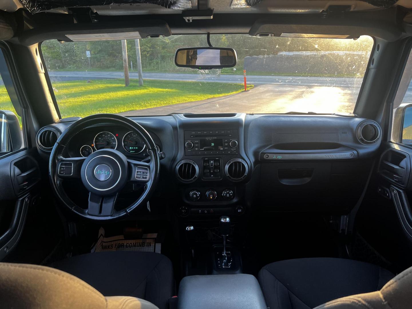 2016 Silver /Black Jeep Wrangler Unlimited Sport 4WD (1C4HJWDG7GL) with an 3.6L V6 DOHC 24V engine, 5-Speed Automatic transmission, located at 547 E. Main St., Orwell, OH, 44076, (440) 437-5893, 41.535435, -80.847855 - This 2016 Jeep Wrangler Unlimited Sport S is equipped with robust off-road capabilities and practical features. It houses a 3.6-liter Pentastar V6 engine paired with a 5-speed automatic transmission, offering a solid balance between on-road comfort and rugged performance. Notably equipped with LED h - Photo#29