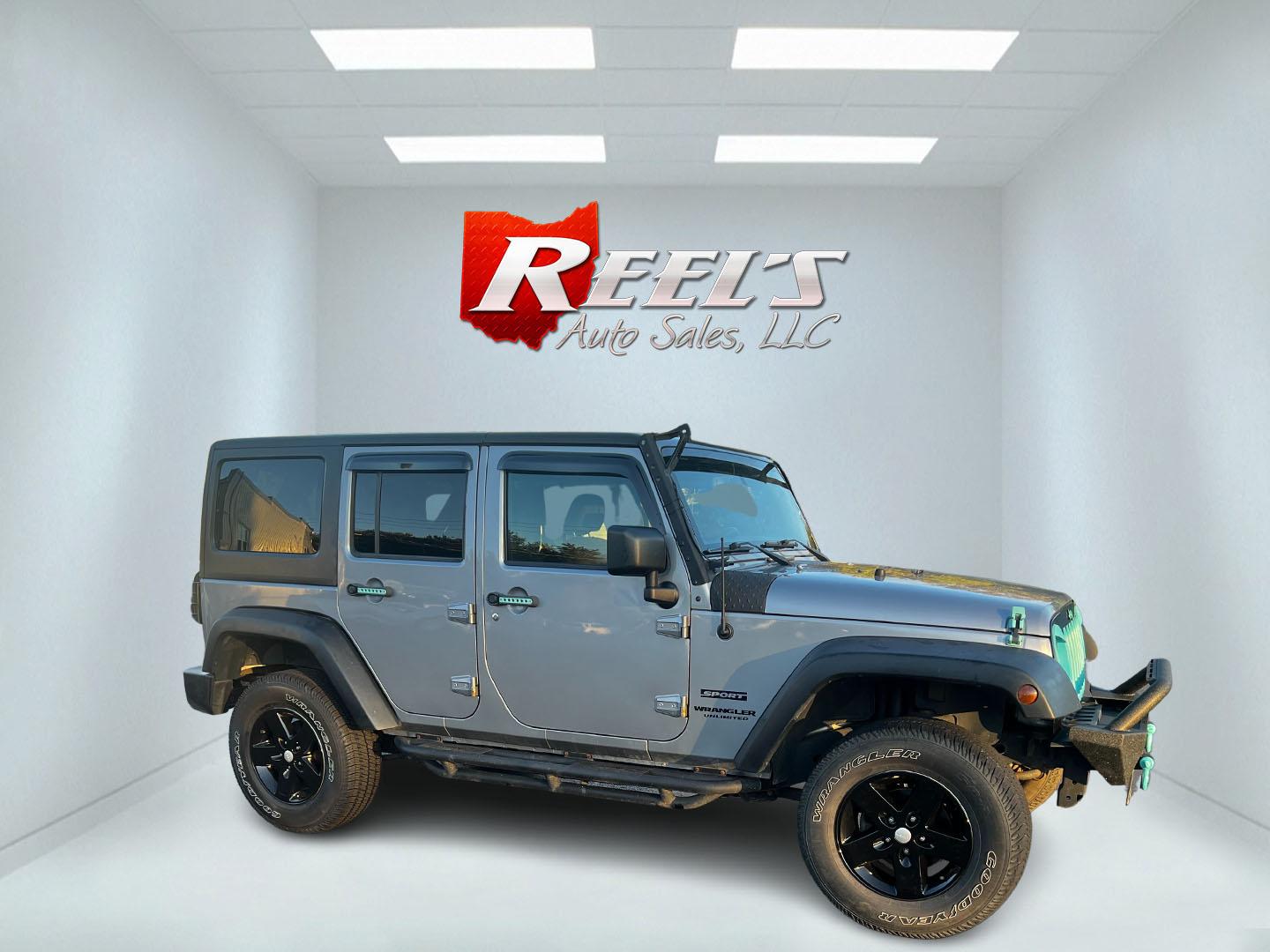 2016 Silver /Black Jeep Wrangler Unlimited Sport 4WD (1C4HJWDG7GL) with an 3.6L V6 DOHC 24V engine, 5-Speed Automatic transmission, located at 547 E. Main St., Orwell, OH, 44076, (440) 437-5893, 41.535435, -80.847855 - This 2016 Jeep Wrangler Unlimited Sport S is equipped with robust off-road capabilities and practical features. It houses a 3.6-liter Pentastar V6 engine paired with a 5-speed automatic transmission, offering a solid balance between on-road comfort and rugged performance. Notably equipped with LED h - Photo#3