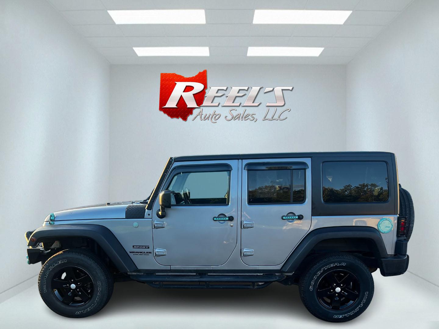 2016 Silver /Black Jeep Wrangler Unlimited Sport 4WD (1C4HJWDG7GL) with an 3.6L V6 DOHC 24V engine, 5-Speed Automatic transmission, located at 547 E. Main St., Orwell, OH, 44076, (440) 437-5893, 41.535435, -80.847855 - This 2016 Jeep Wrangler Unlimited Sport S is equipped with robust off-road capabilities and practical features. It houses a 3.6-liter Pentastar V6 engine paired with a 5-speed automatic transmission, offering a solid balance between on-road comfort and rugged performance. Notably equipped with LED h - Photo#7