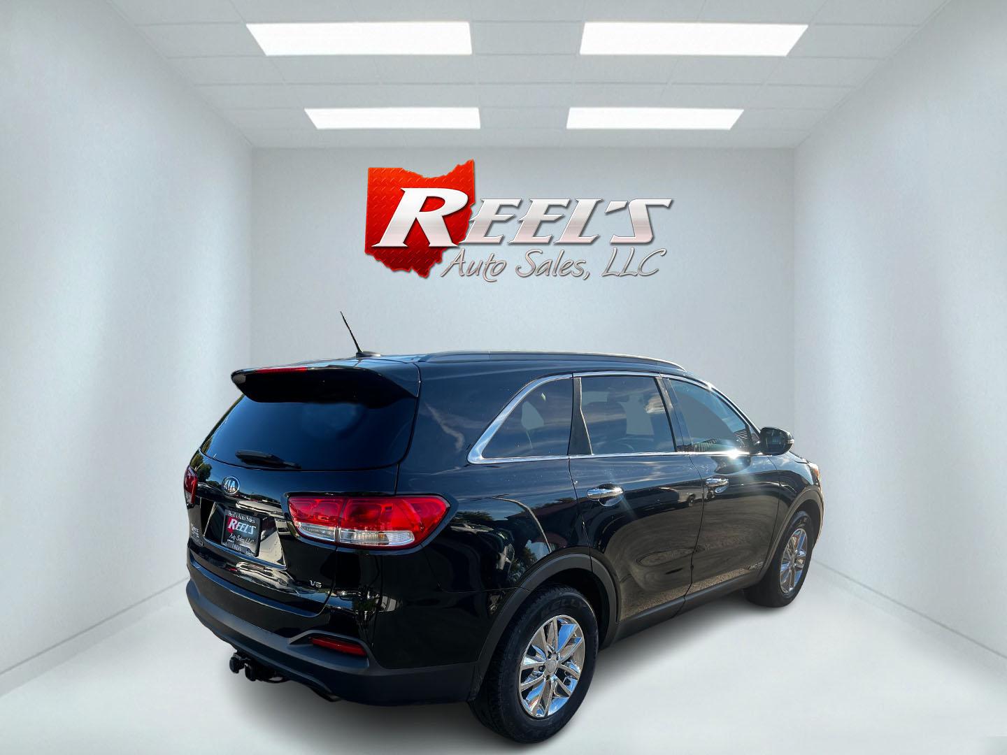 2016 Black /Black Kia Sorento LX V6 AWD (5XYPGDA5XGG) with an 3.3L V6 DOHC 24V engine, 6-Speed Automatic transmission, located at 547 E. Main St., Orwell, OH, 44076, (440) 437-5893, 41.535435, -80.847855 - Photo#5