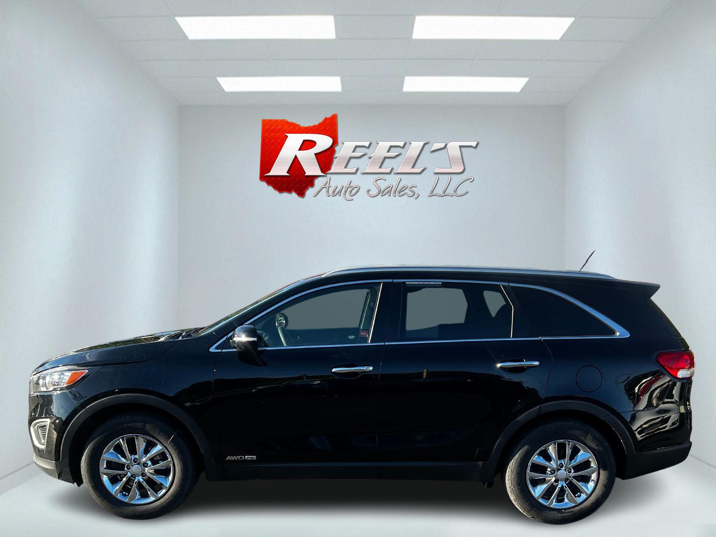 2016 Black /Black Kia Sorento LX V6 AWD (5XYPGDA5XGG) with an 3.3L V6 DOHC 24V engine, 6-Speed Automatic transmission, located at 547 E. Main St., Orwell, OH, 44076, (440) 437-5893, 41.535435, -80.847855 - Photo#8