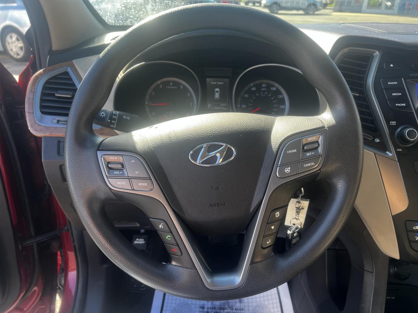 2016 Red /Brown Hyundai Santa Fe Sport 2.4 AWD (5XYZTDLB3GG) with an 2.4L I4 DOHC 16V engine, 6-Speed Automatic transmission, located at 547 E. Main St., Orwell, OH, 44076, (440) 437-5893, 41.535435, -80.847855 - Photo#21