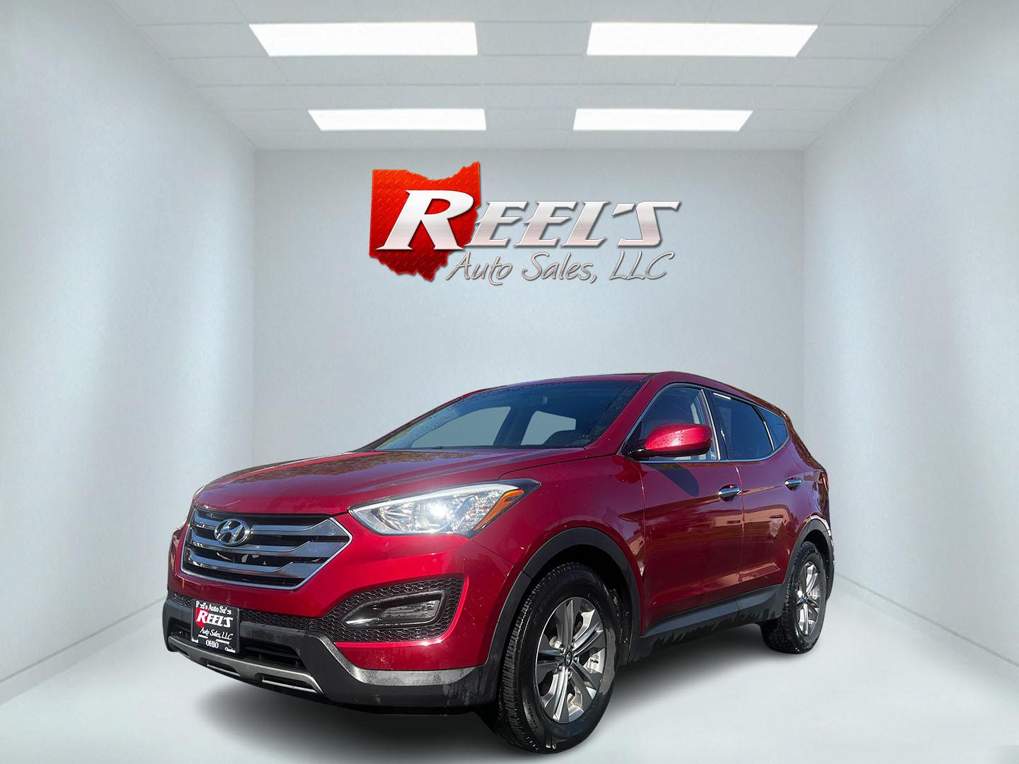 2016 Red /Brown Hyundai Santa Fe Sport 2.4 AWD (5XYZTDLB3GG) with an 2.4L I4 DOHC 16V engine, 6-Speed Automatic transmission, located at 547 E. Main St., Orwell, OH, 44076, (440) 437-5893, 41.535435, -80.847855 - Photo#0