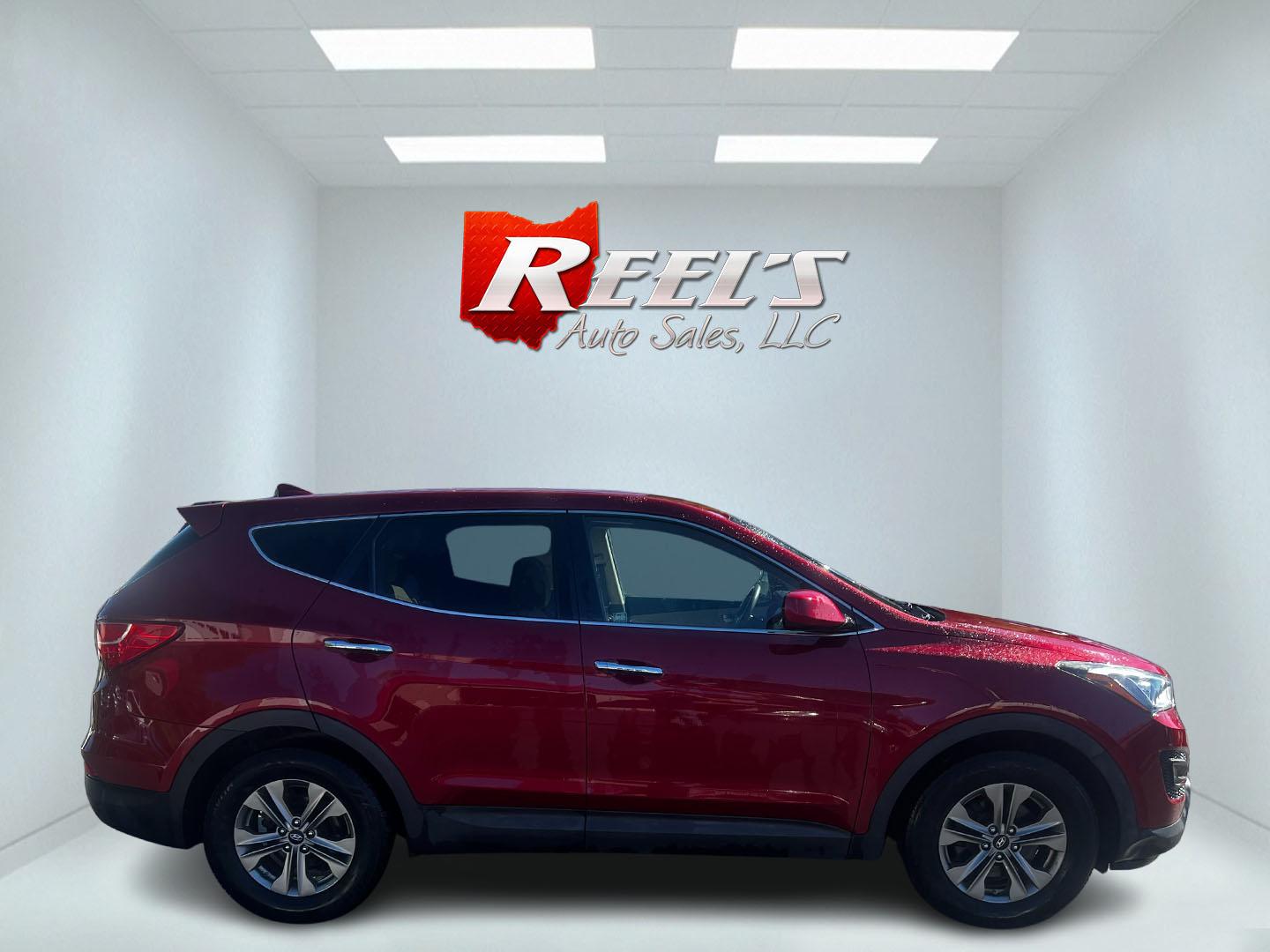 2016 Red /Brown Hyundai Santa Fe Sport 2.4 AWD (5XYZTDLB3GG) with an 2.4L I4 DOHC 16V engine, 6-Speed Automatic transmission, located at 547 E. Main St., Orwell, OH, 44076, (440) 437-5893, 41.535435, -80.847855 - Photo#4