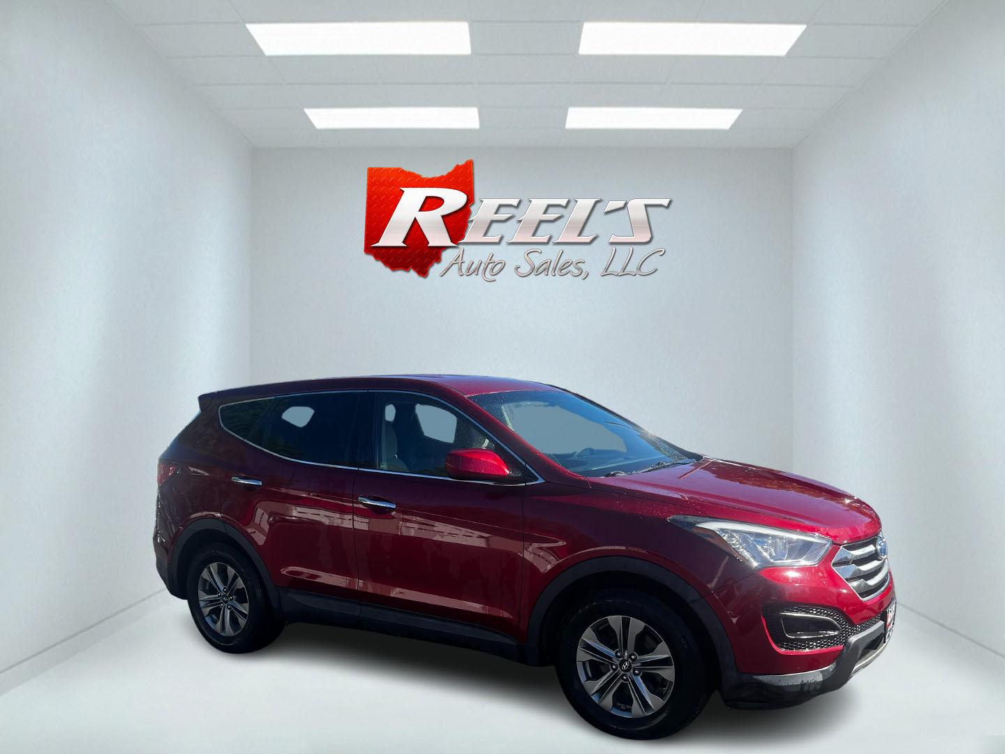 2016 Red /Brown Hyundai Santa Fe Sport 2.4 AWD (5XYZTDLB3GG) with an 2.4L I4 DOHC 16V engine, 6-Speed Automatic transmission, located at 547 E. Main St., Orwell, OH, 44076, (440) 437-5893, 41.535435, -80.847855 - Photo#3