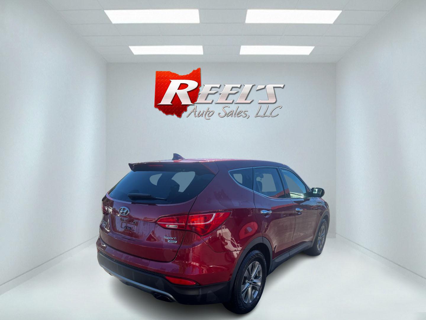 2016 Red /Brown Hyundai Santa Fe Sport 2.4 AWD (5XYZTDLB3GG) with an 2.4L I4 DOHC 16V engine, 6-Speed Automatic transmission, located at 547 E. Main St., Orwell, OH, 44076, (440) 437-5893, 41.535435, -80.847855 - Photo#5