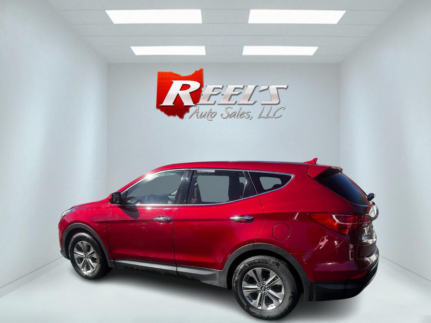 2016 Red /Brown Hyundai Santa Fe Sport 2.4 AWD (5XYZTDLB3GG) with an 2.4L I4 DOHC 16V engine, 6-Speed Automatic transmission, located at 547 E. Main St., Orwell, OH, 44076, (440) 437-5893, 41.535435, -80.847855 - Photo#8