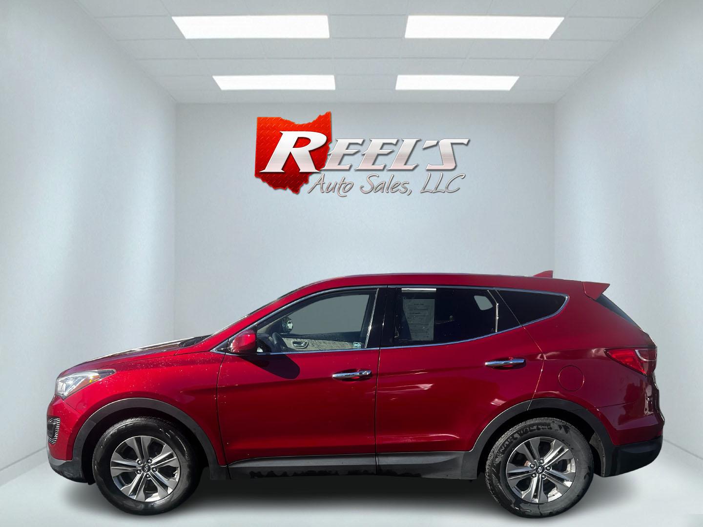 2016 Red /Brown Hyundai Santa Fe Sport 2.4 AWD (5XYZTDLB3GG) with an 2.4L I4 DOHC 16V engine, 6-Speed Automatic transmission, located at 547 E. Main St., Orwell, OH, 44076, (440) 437-5893, 41.535435, -80.847855 - Photo#9