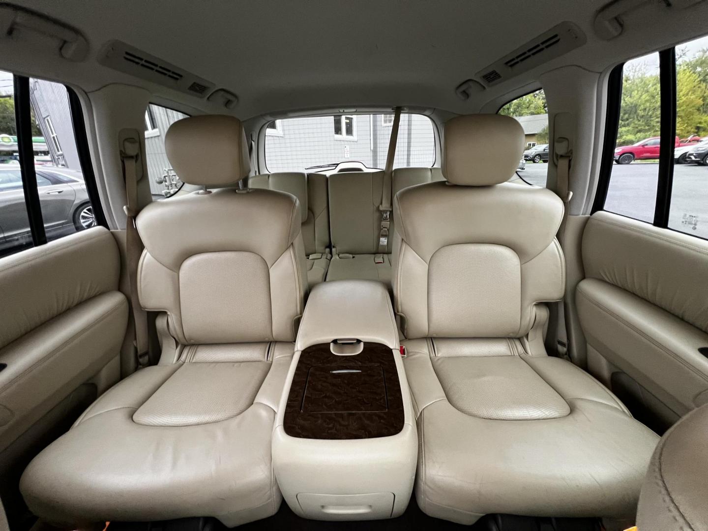 2017 White /Tan Infiniti QX80 Base 4WD (JN8AZ2NE3H9) with an 5.6L V8 DOHC 32V engine, 7A transmission, located at 11115 Chardon Rd. , Chardon, OH, 44024, (440) 214-9705, 41.580246, -81.241943 - This 2017 Infiniti QX80 AWD is a luxurious full-size SUV offering impressive power and capability with its 5.6-liter V8 engine delivering 400 horsepower and a 7-speed automatic transmission. The vehicle is equipped with a Tow Haul Mode and Snow Mode and features a full-time 5WD system, ideal for cha - Photo#36