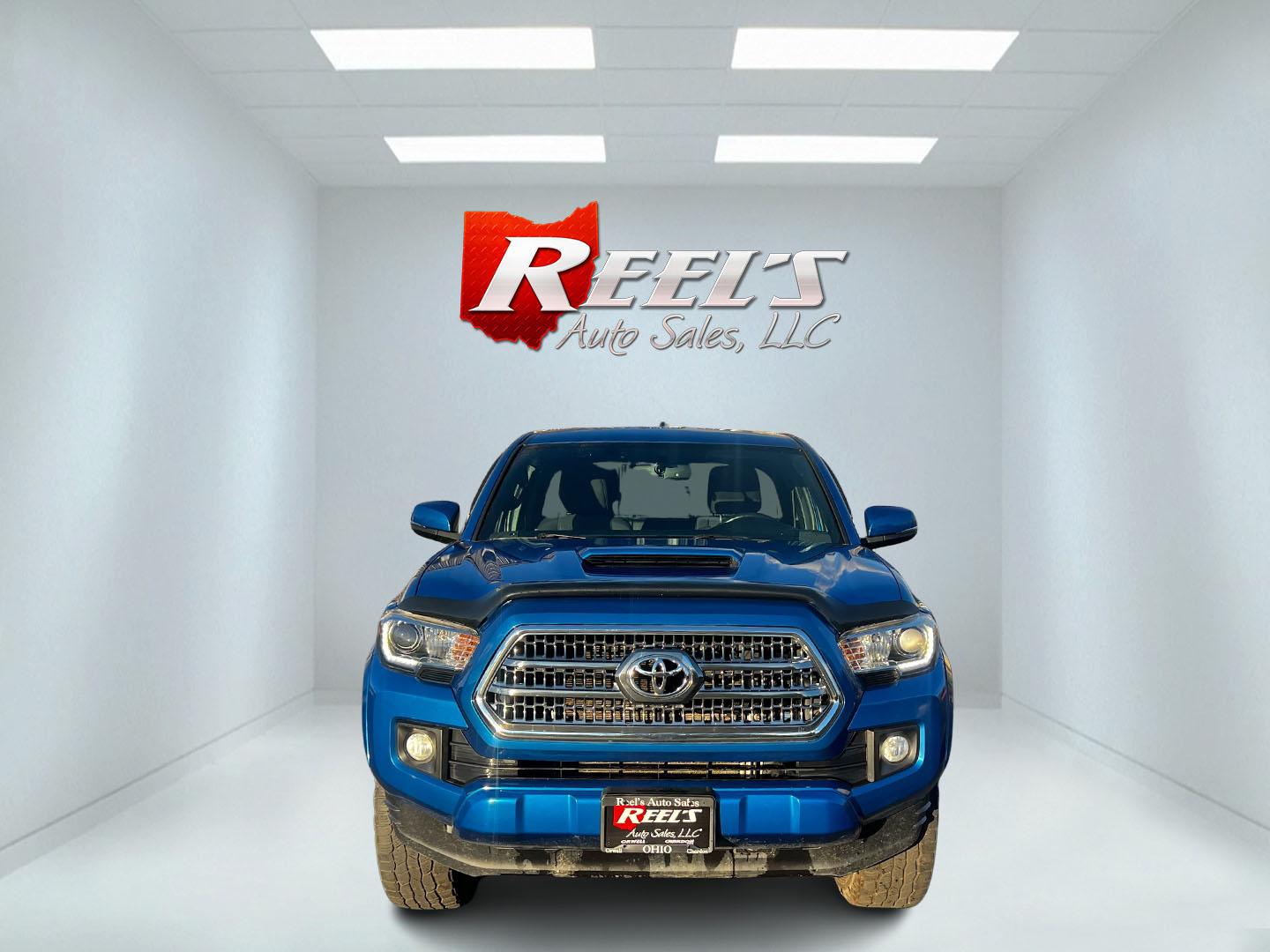 2017 Blue /Black Toyota Tacoma TRD Sport Access Cab V6 6AT 4WD (5TFSZ5AN9HX) with an 3.5L V6 DOHC 24V engine, 6A transmission, located at 11115 Chardon Rd. , Chardon, OH, 44024, (440) 214-9705, 41.580246, -81.241943 - Photo#1