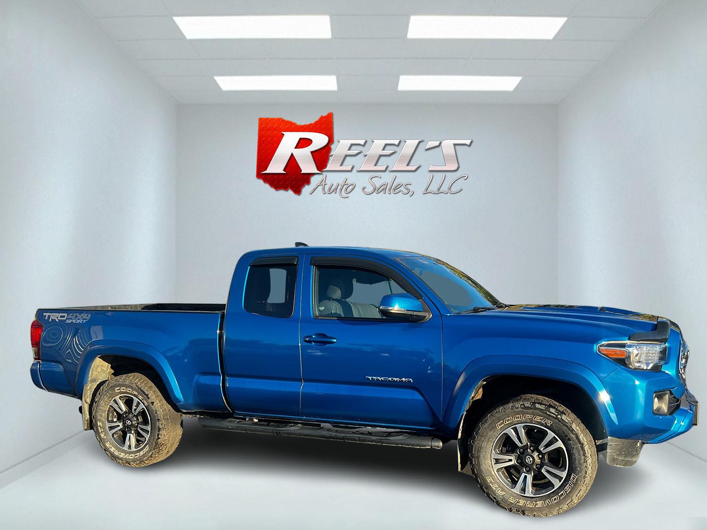 2017 Blue /Black Toyota Tacoma TRD Sport Access Cab V6 6AT 4WD (5TFSZ5AN9HX) with an 3.5L V6 DOHC 24V engine, 6A transmission, located at 11115 Chardon Rd. , Chardon, OH, 44024, (440) 214-9705, 41.580246, -81.241943 - Photo#3