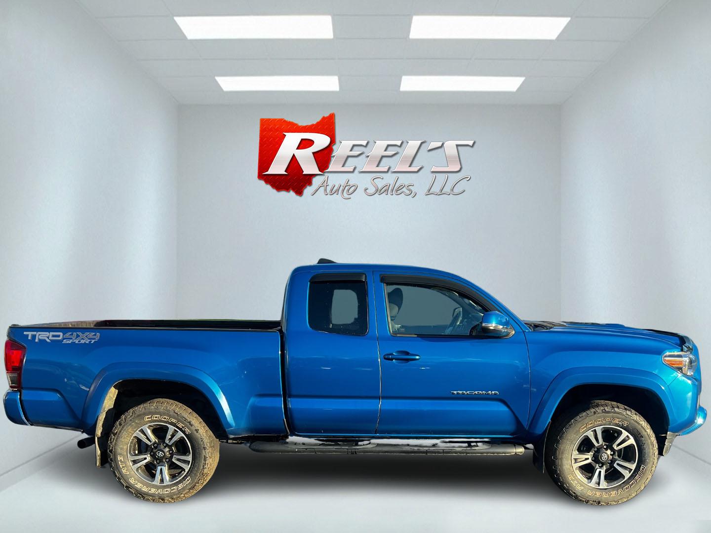 2017 Blue /Black Toyota Tacoma TRD Sport Access Cab V6 6AT 4WD (5TFSZ5AN9HX) with an 3.5L V6 DOHC 24V engine, 6A transmission, located at 11115 Chardon Rd. , Chardon, OH, 44024, (440) 214-9705, 41.580246, -81.241943 - Photo#4