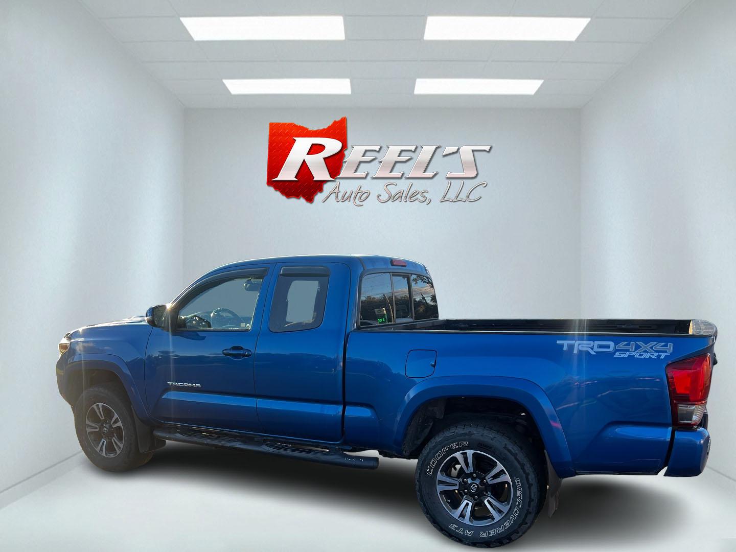 2017 Blue /Black Toyota Tacoma TRD Sport Access Cab V6 6AT 4WD (5TFSZ5AN9HX) with an 3.5L V6 DOHC 24V engine, 6A transmission, located at 11115 Chardon Rd. , Chardon, OH, 44024, (440) 214-9705, 41.580246, -81.241943 - Photo#7