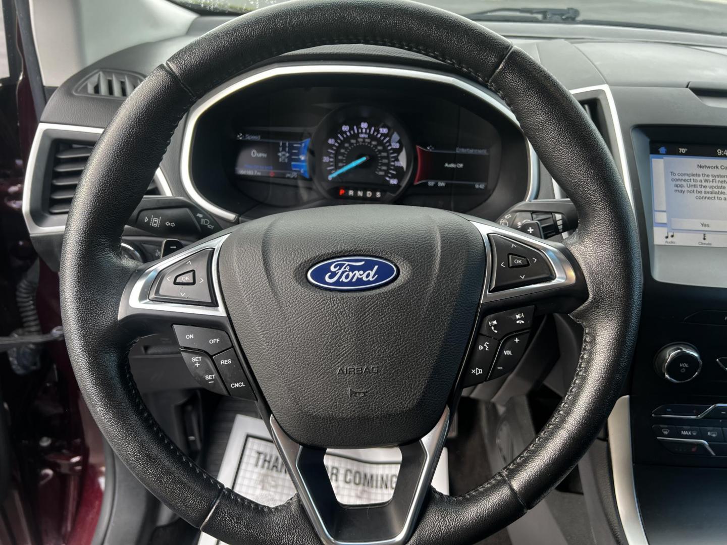 2019 Burgundy /Black Ford Edge SEL AWD (2FMPK4J96KB) with an 2.0L I4 DOHC 16V Turbo engine, 8-Speed Automatic transmission, located at 11115 Chardon Rd. , Chardon, OH, 44024, (440) 214-9705, 41.580246, -81.241943 - This One Owner 2019 Ford Edge SEL AWD is a sophisticated midsize SUV combining performance, technology, and comfort. It features a 2.0-liter turbocharged I4 EcoBoost engine with a 8-speed automatic transmission, providing a balanced driving experience with efficiency and power. The interior is well- - Photo#21