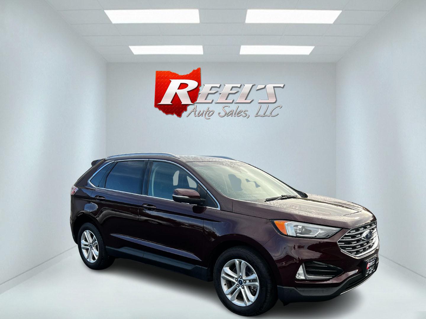 2019 Burgundy /Black Ford Edge SEL AWD (2FMPK4J96KB) with an 2.0L I4 DOHC 16V Turbo engine, 8-Speed Automatic transmission, located at 11115 Chardon Rd. , Chardon, OH, 44024, (440) 214-9705, 41.580246, -81.241943 - This One Owner 2019 Ford Edge SEL AWD is a sophisticated midsize SUV combining performance, technology, and comfort. It features a 2.0-liter turbocharged I4 EcoBoost engine with a 8-speed automatic transmission, providing a balanced driving experience with efficiency and power. The interior is well- - Photo#3