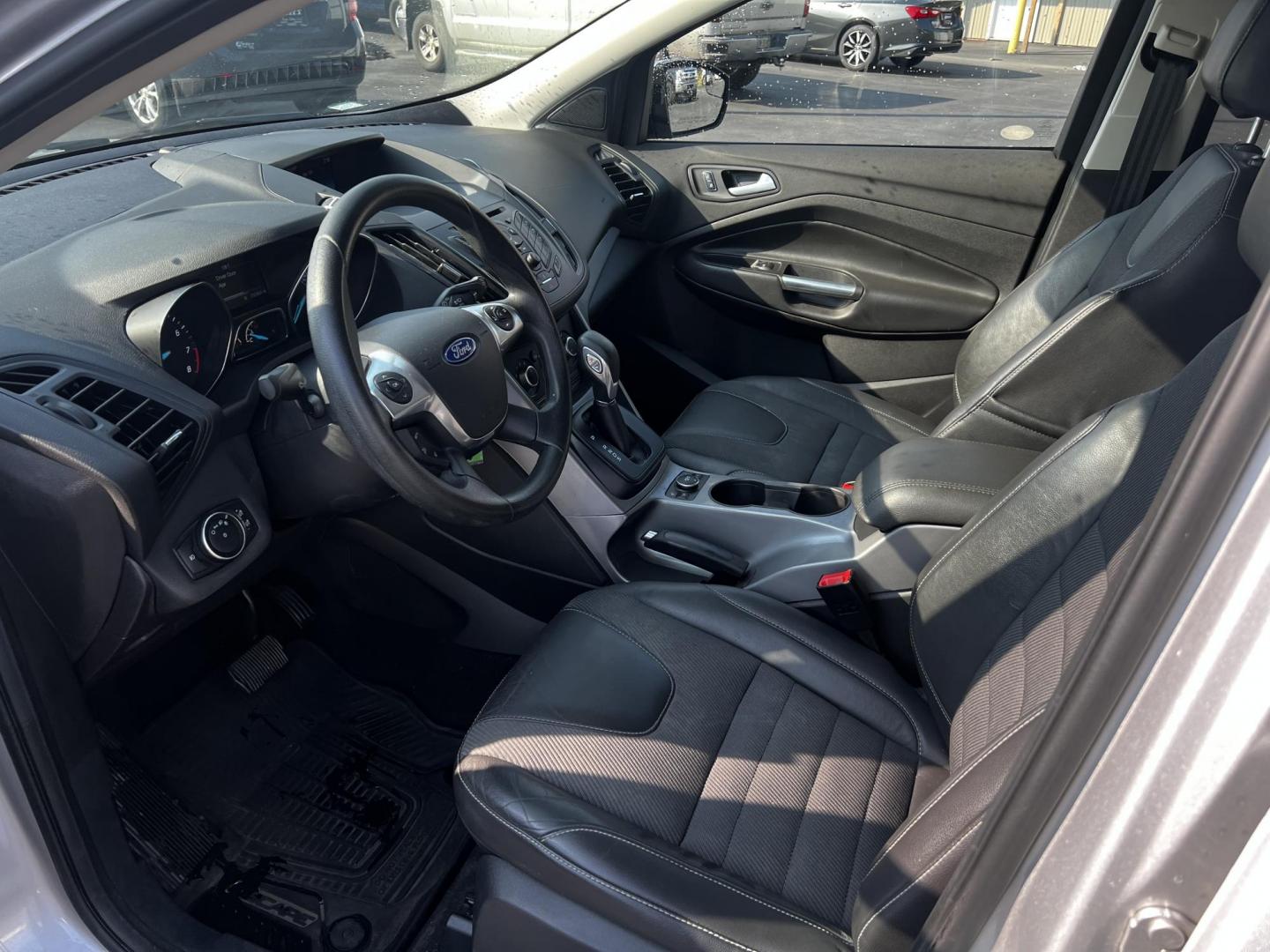 2016 Silver /Black Ford Escape SE 4WD (1FMCU9GX4GU) with an 1.6L I4 DOHC 16V TURBO engine, 6-Speed Automatic transmission, located at 547 E. Main St., Orwell, OH, 44076, (440) 437-5893, 41.535435, -80.847855 - This 2016 Ford Escape SE with a 1.6-liter turbocharged I4 EcoBoost engine paired with a 6-speed automatic transmission offers a solid blend of performance and fuel efficiency, achieving up to 29 MPG on the highway. This compact SUV is equipped with practical features such as daytime running lights, - Photo#13