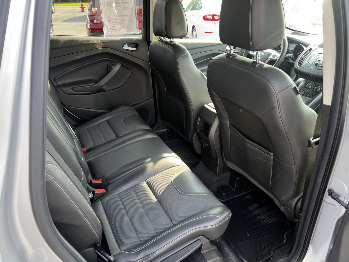 2016 Silver /Black Ford Escape SE 4WD (1FMCU9GX4GU) with an 1.6L I4 DOHC 16V TURBO engine, 6-Speed Automatic transmission, located at 547 E. Main St., Orwell, OH, 44076, (440) 437-5893, 41.535435, -80.847855 - This 2016 Ford Escape SE with a 1.6-liter turbocharged I4 EcoBoost engine paired with a 6-speed automatic transmission offers a solid blend of performance and fuel efficiency, achieving up to 29 MPG on the highway. This compact SUV is equipped with practical features such as daytime running lights, - Photo#33