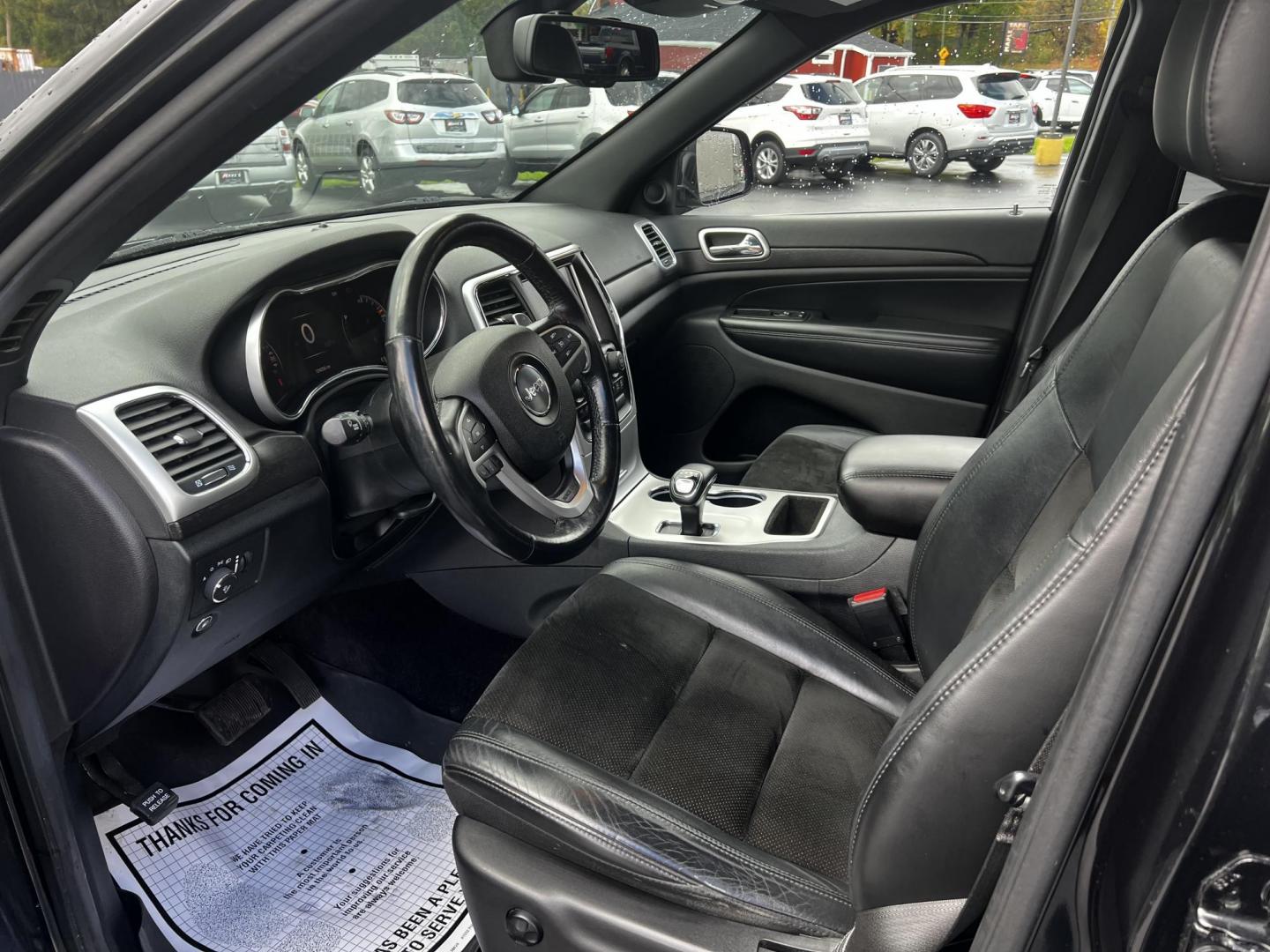 2015 Black /Black Jeep Grand Cherokee Altitude 4WD (1C4RJFAG1FC) with an 3.6L V6 DOHC 24V FFV engine, 8-Speed Automatic transmission, located at 547 E. Main St., Orwell, OH, 44076, (440) 437-5893, 41.535435, -80.847855 - Photo#19