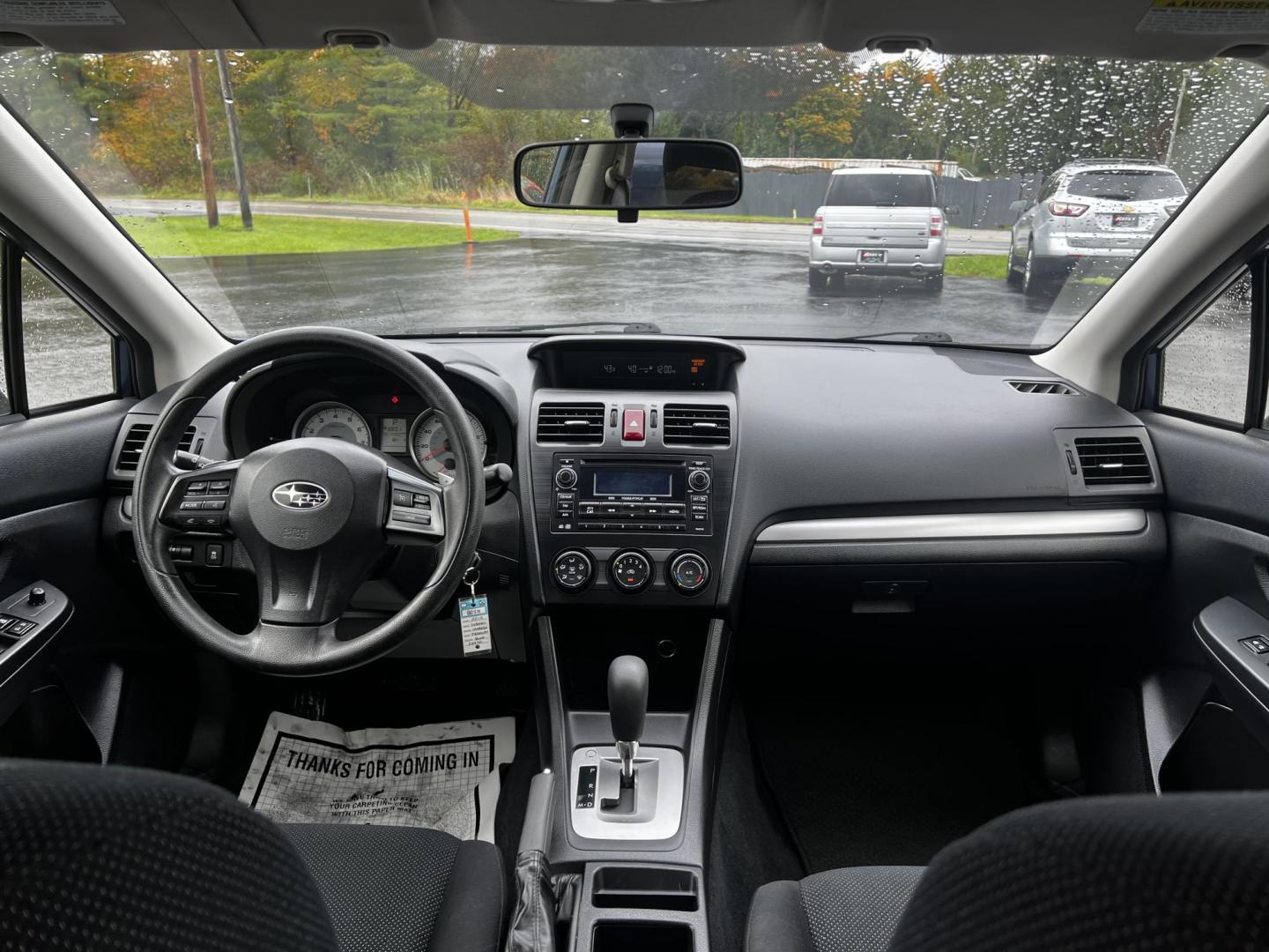 2013 Blue /Black Subaru Impreza 2.0i Premium 4-Door w/All Weather Package (JF1GJAC68DH) with an 2.0L H4 DOHC 16V engine, Automatic transmission, located at 11115 Chardon Rd. , Chardon, OH, 44024, (440) 214-9705, 41.580246, -81.241943 - This 2013 Subaru Impreza Premium offers a balanced combination of efficiency and all-weather capability, featuring a 2.0-liter H4 PZEV engine that achieves an impressive 35 MPG on the highway. This model is equipped with Subaru's renowned Symmetrical All-Wheel Drive system, delivering enhanced stabi - Photo#28