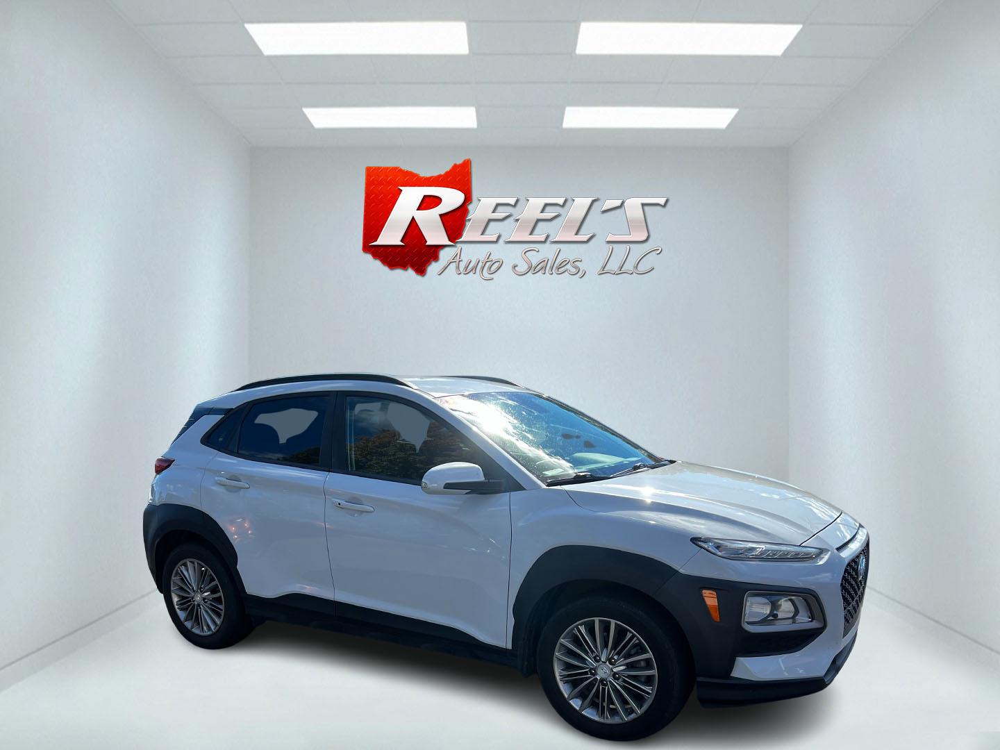 2019 White /Black Hyundai Kona SEL AWD (KM8K2CAA7KU) with an 2.0L I4 DOHC 16V engine, 6 Speed Automatic transmission, located at 547 E. Main St., Orwell, OH, 44076, (440) 437-5893, 41.535435, -80.847855 - This One Owner 2019 Hyundai Kona SEL AWD is a compact SUV that combines efficiency, safety, and technology features. Powered by a 2.0-liter I4 Atkinson engine coupled with a 6-speed automatic transmission, it delivers a commendable fuel efficiency of approximately 30 MPG on the highway. It is equipp - Photo#3