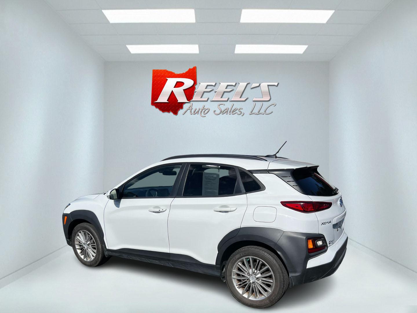 2019 White /Black Hyundai Kona SEL AWD (KM8K2CAA7KU) with an 2.0L I4 DOHC 16V engine, 6 Speed Automatic transmission, located at 547 E. Main St., Orwell, OH, 44076, (440) 437-5893, 41.535435, -80.847855 - This One Owner 2019 Hyundai Kona SEL AWD is a compact SUV that combines efficiency, safety, and technology features. Powered by a 2.0-liter I4 Atkinson engine coupled with a 6-speed automatic transmission, it delivers a commendable fuel efficiency of approximately 30 MPG on the highway. It is equipp - Photo#8