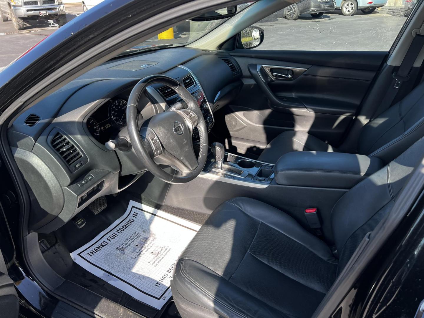 2014 Black /Black Nissan Altima 2.5 SL (1N4AL3AP1EC) with an 2.5L I4 DOHC 16V engine, Automatic transmission, located at 11115 Chardon Rd. , Chardon, OH, 44024, (440) 214-9705, 41.580246, -81.241943 - This One Owner 2014 Nissan Altima 2.5 SL is a midsize sedan that effectively combines efficiency, comfort, and technology. It features a 2.5-liter inline-4 engine achieving up to 37 MPG on the highway, with a Sport Mode for enhanced driving dynamics. Interior highlights include a leather interior, p - Photo#13