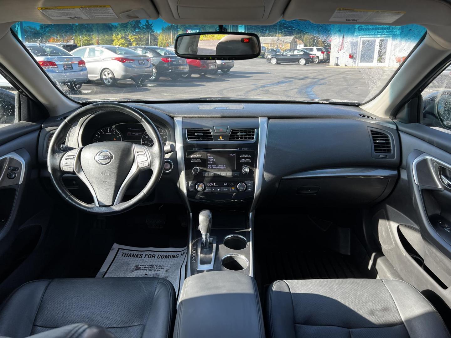 2014 Black /Black Nissan Altima 2.5 SL (1N4AL3AP1EC) with an 2.5L I4 DOHC 16V engine, Automatic transmission, located at 11115 Chardon Rd. , Chardon, OH, 44024, (440) 214-9705, 41.580246, -81.241943 - This One Owner 2014 Nissan Altima 2.5 SL is a midsize sedan that effectively combines efficiency, comfort, and technology. It features a 2.5-liter inline-4 engine achieving up to 37 MPG on the highway, with a Sport Mode for enhanced driving dynamics. Interior highlights include a leather interior, p - Photo#32