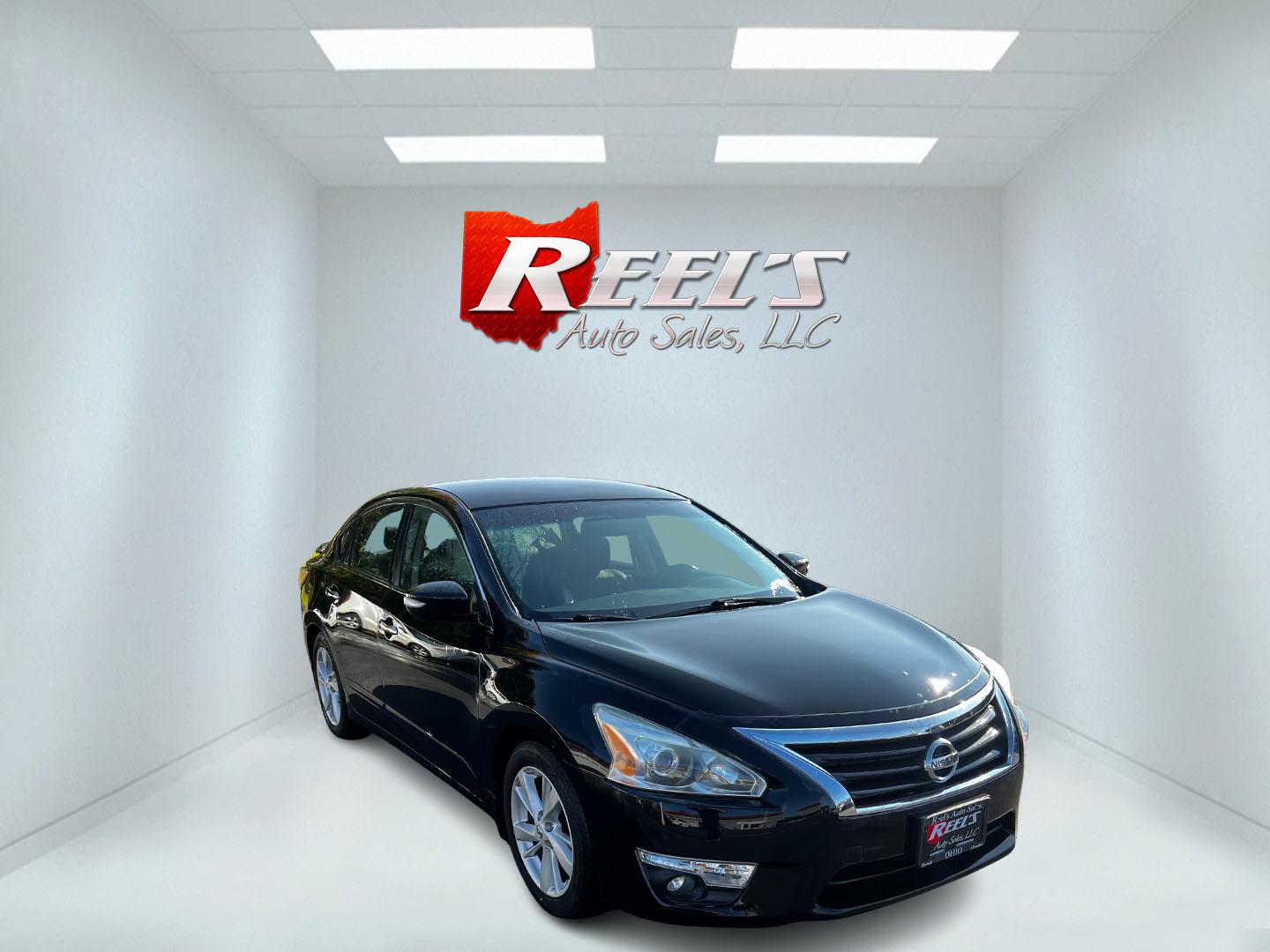 2014 Black /Black Nissan Altima 2.5 SL (1N4AL3AP1EC) with an 2.5L I4 DOHC 16V engine, Automatic transmission, located at 11115 Chardon Rd. , Chardon, OH, 44024, (440) 214-9705, 41.580246, -81.241943 - This One Owner 2014 Nissan Altima 2.5 SL is a midsize sedan that effectively combines efficiency, comfort, and technology. It features a 2.5-liter inline-4 engine achieving up to 37 MPG on the highway, with a Sport Mode for enhanced driving dynamics. Interior highlights include a leather interior, p - Photo#2