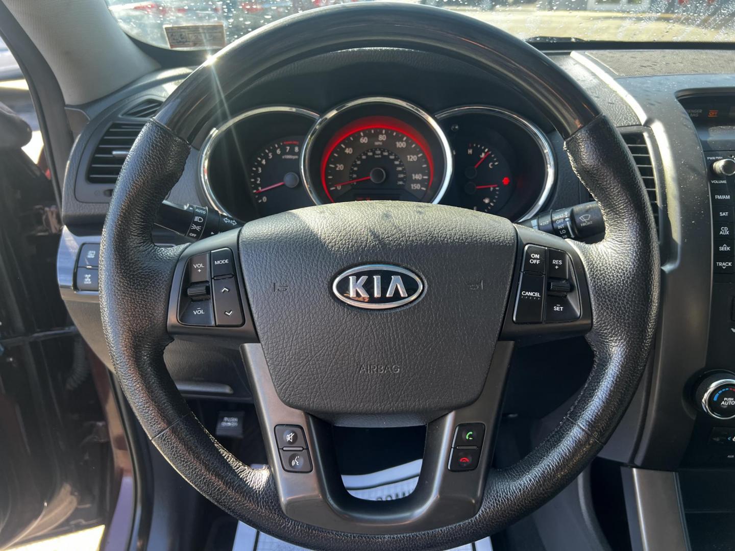 2013 Burgundy /Black Kia Sorento SX 4WD (5XYKWDA25DG) with an 3.5L V6 DOHC 24V engine, 6-Speed Automatic transmission, located at 547 E. Main St., Orwell, OH, 44076, (440) 437-5893, 41.535435, -80.847855 - Photo#26