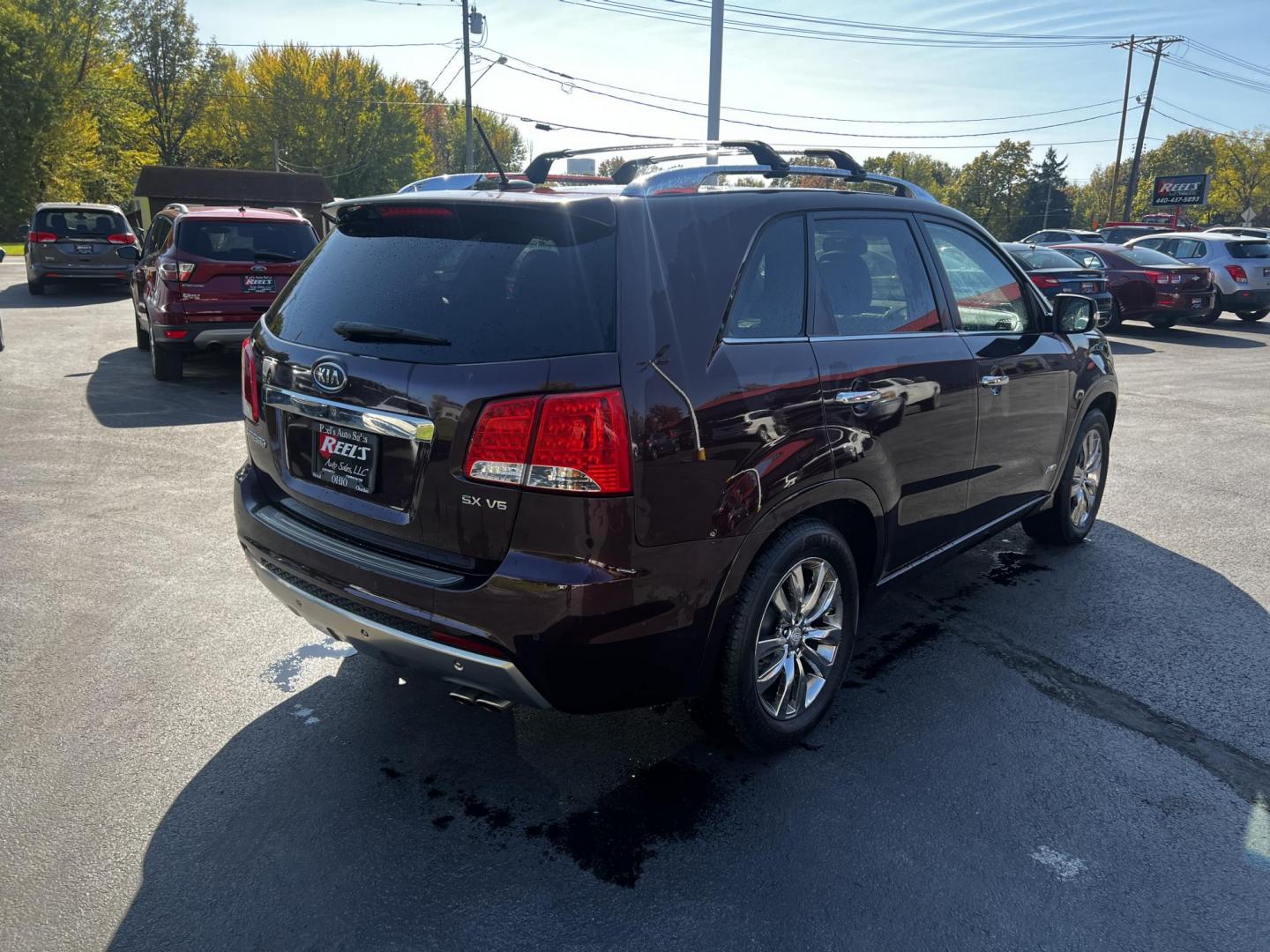 2013 Burgundy /Black Kia Sorento SX 4WD (5XYKWDA25DG) with an 3.5L V6 DOHC 24V engine, 6-Speed Automatic transmission, located at 547 E. Main St., Orwell, OH, 44076, (440) 437-5893, 41.535435, -80.847855 - Photo#8