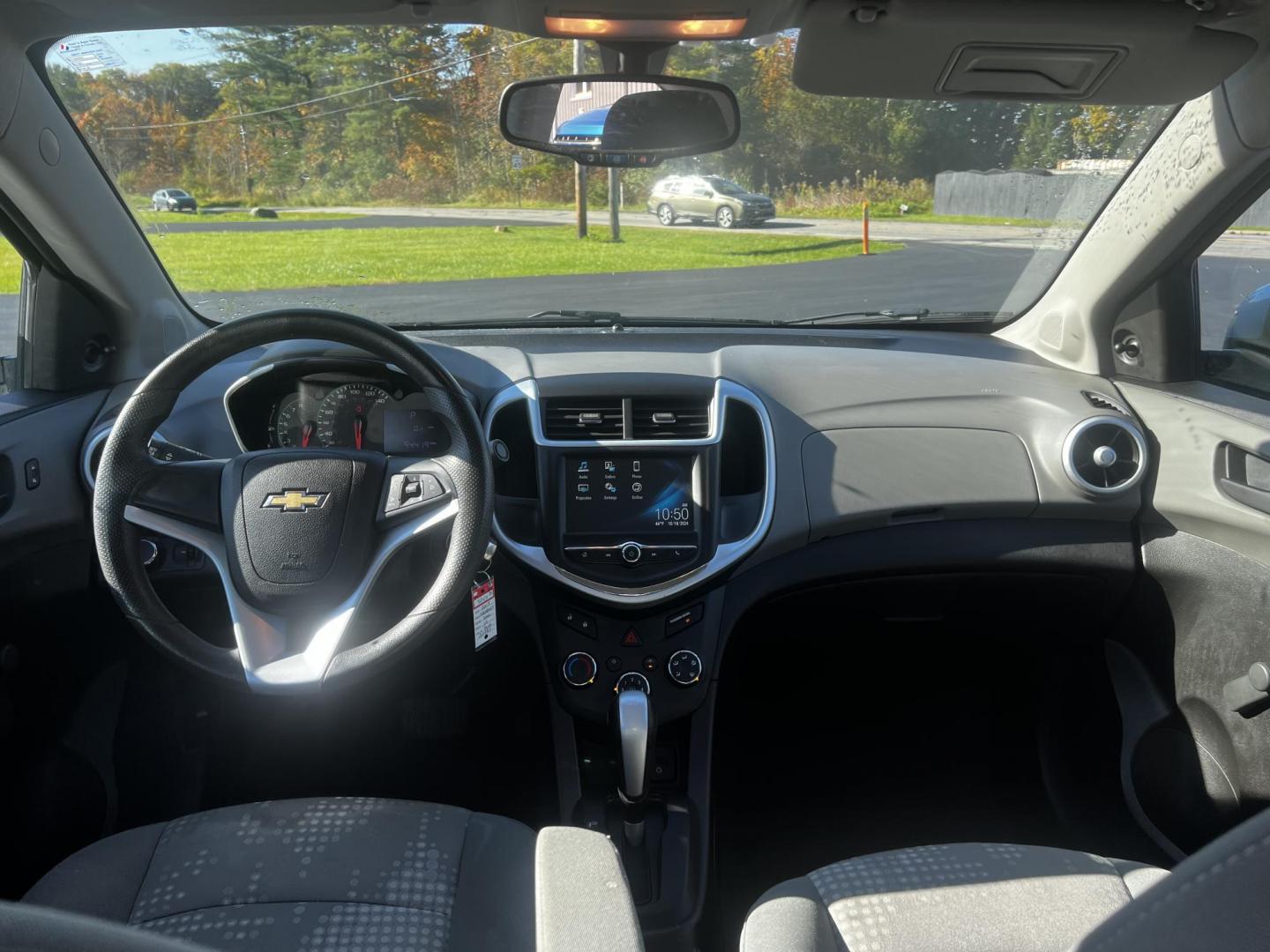 2017 Blue /Gray Chevrolet Sonic LS Auto Sedan (1G1JB5SG5H4) with an 1.8L I4 DOHC 24V engine, 6 Speed Auto transmission, located at 11115 Chardon Rd. , Chardon, OH, 44024, (440) 214-9705, 41.580246, -81.241943 - Photo#29