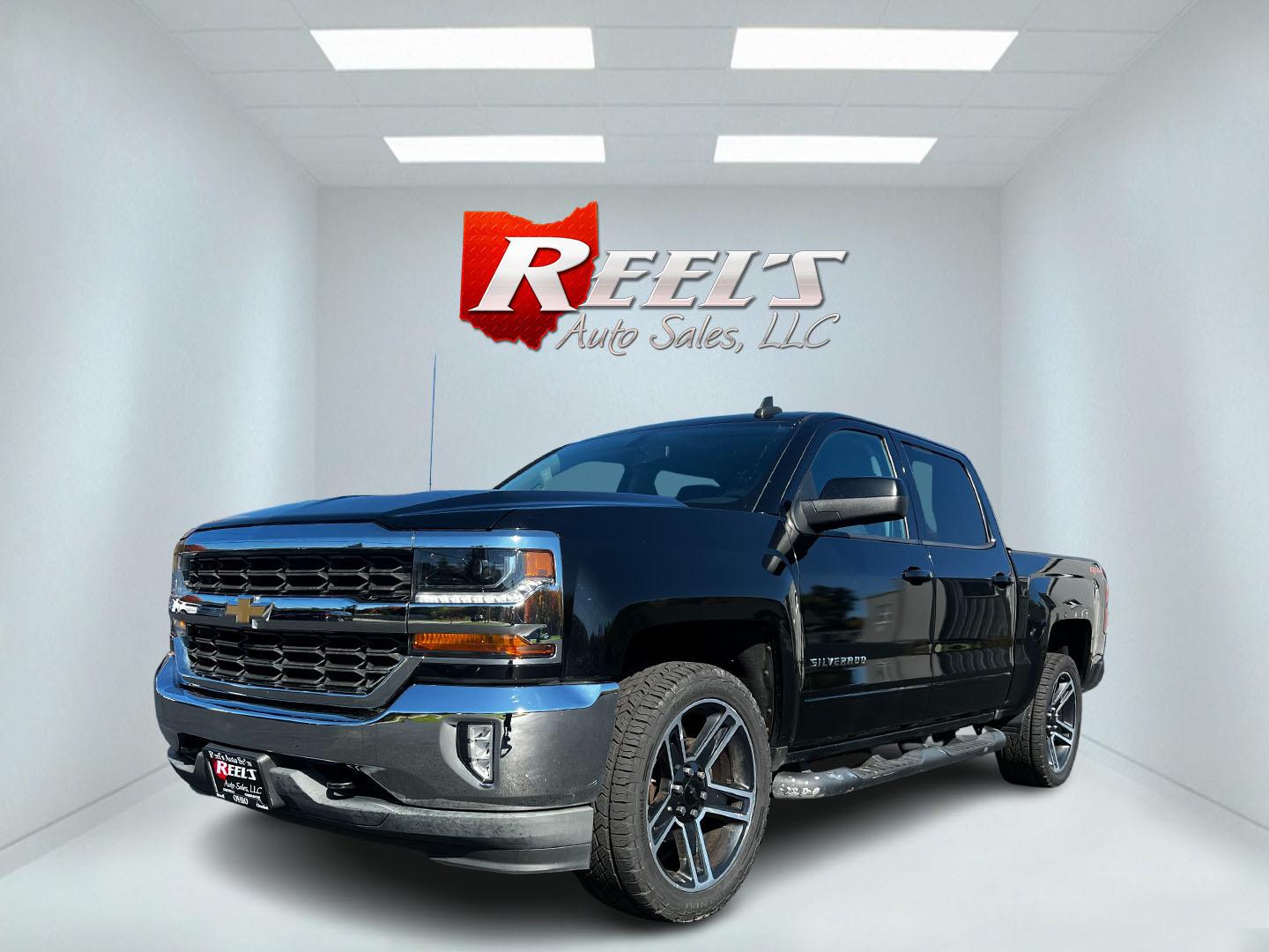 2016 Black /Black Chevrolet Silverado 1500 LT Crew Cab 4WD (3GCUKREC9GG) with an 5.3L V8 OHV 16V engine, 6A transmission, located at 11115 Chardon Rd. , Chardon, OH, 44024, (440) 214-9705, 41.580246, -81.241943 - This One Owner 2016 Chevrolet Silverado 1500 LT Crew Cab offers a robust combination of features suitable for both utility and comfort. It's powered by a 5.3-liter Vortec V8 engine paired with a 6-speed automatic transmission, delivering 355 horsepower and a towing capacity of up to 9,100 pounds, th - Photo#0