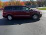 2015 Red /Black Chrysler Town & Country Touring (2C4RC1BG1FR) with an 3.6L V6 DOHC 24V FFV engine, 6-Speed Automatic transmission, located at 11115 Chardon Rd. , Chardon, OH, 44024, (440) 214-9705, 41.580246, -81.241943 - Photo#6