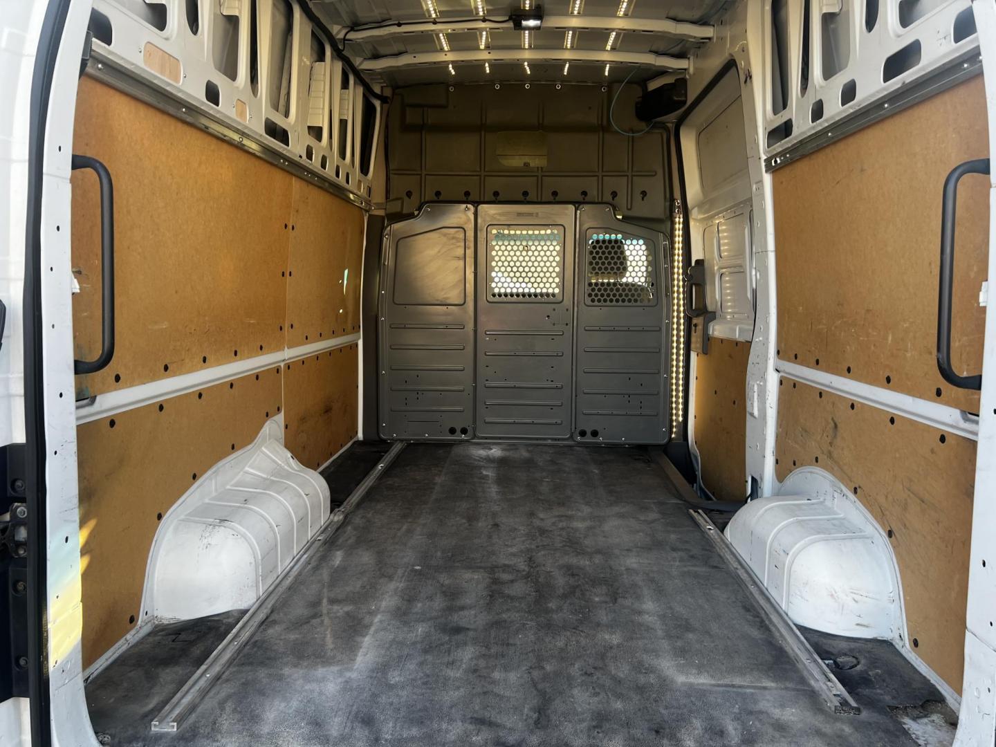 2015 White /Gray Nissan NV Cargo 2500 HD SV V8 High Roof (1N6AF0LY4FN) with an 5.6L V8 DOHC 32V engine, 5-Speed Automatic transmission, located at 11115 Chardon Rd. , Chardon, OH, 44024, (440) 214-9705, 41.580246, -81.241943 - Photo#24