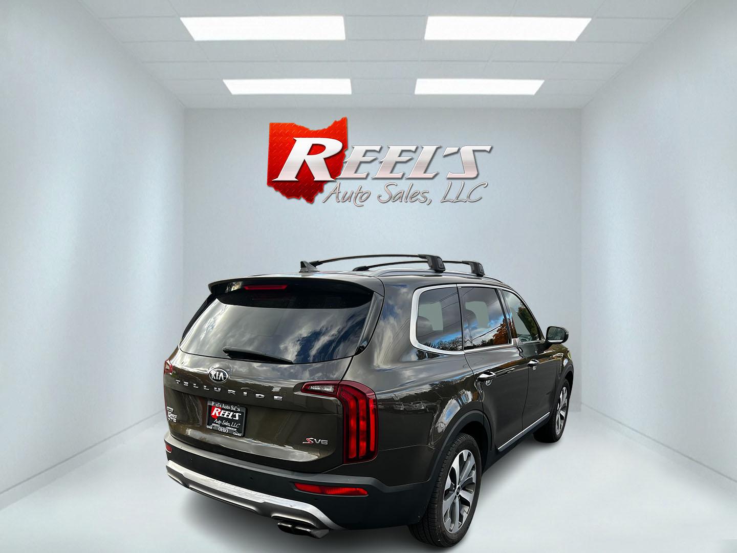 2020 Green /Black Kia Telluride S AWD (5XYP6DHCXLG) with an 3.8L V6 DOHC 24V engine, 8A transmission, located at 547 E. Main St., Orwell, OH, 44076, (440) 437-5893, 41.535435, -80.847855 - This 2020 Kia Telluride S AWD is a mid-size SUV that combines practicality with a range of modern features. It is powered by a 3.8-liter V6 engine paired with an 8-speed automatic transmission, providing smooth performance. This Telluride is equipped with LED daytime running lights and dusk-sensing - Photo#5