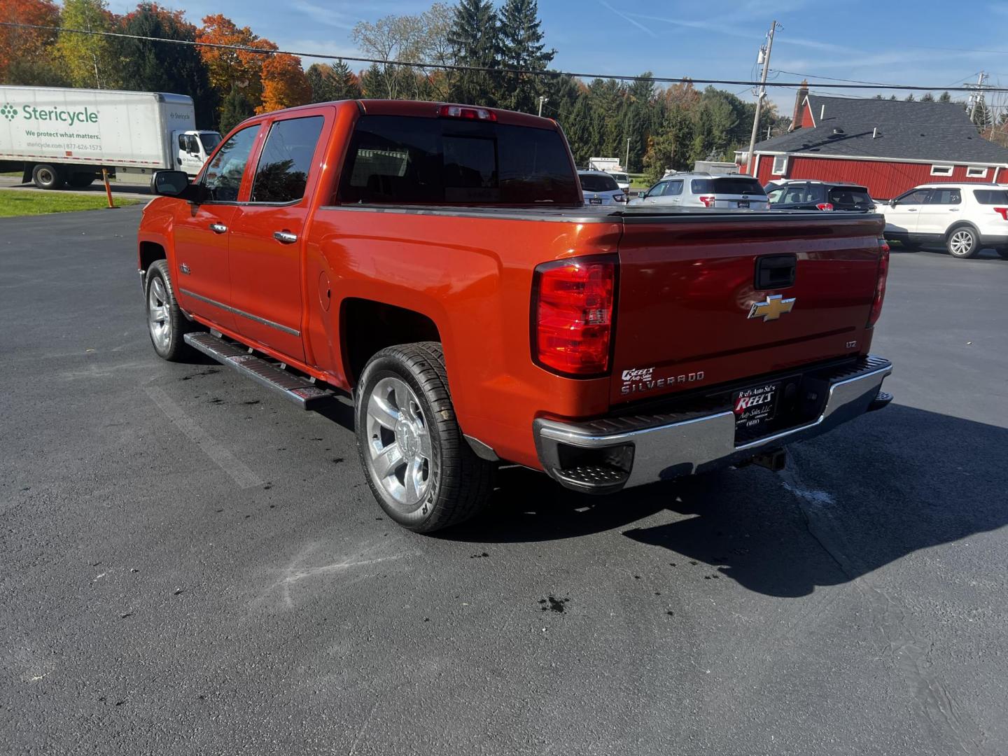 2015 Orange /Black Chevrolet Silverado 1500 LTZ Crew Cab 4WD (3GCUKSEC8FG) with an 5.3L V8 OHV 16V engine, 6-Speed Automatic transmission, located at 11115 Chardon Rd. , Chardon, OH, 44024, (440) 214-9705, 41.580246, -81.241943 - Photo#10